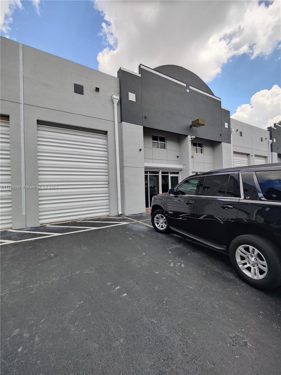 This 2-story office/warehouse is located in Kendallwood Industrial Park. Featuring a modern design with
porcelain tiles throughout. The ground floor includes warehouse area with high ceilings and ample space for
storage and distribution with a 14 Ft street level bay door making it easy to move goods in and out of the
building. A reception area, several private offices, and conference room, a kitchenette and additional private
offices, providing plenty of space for employees and staff to work and collaborate. Upstairs, there is an open-plan mezzanine area. Conveniently located near Tamiami Airport offering easy access. to major highways and
transportation routes. Owner is willing to remove the offices and put back the Warehouse to its original use.