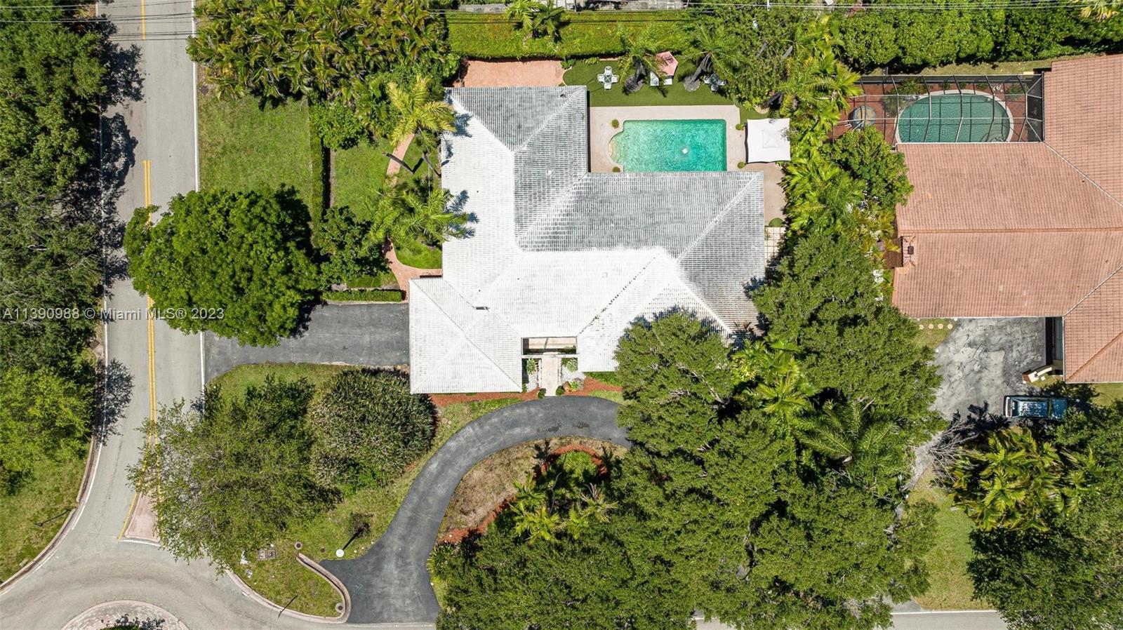 Revel in the elegant charm of this immaculate and spacious 4/3.5 ranch home just 2 blocks from the exclusive Riviera Country Club. Enjoy walking down tree-lined streets to the golf course, the University of Miami, or even a nearby park. The circular paved driveway welcomes you through French doors into a comfortable, open and rewarding interior with continuous pool views beyond the family room's full-length glass windows. This home offers luxurious living and dining room areas and a completely remodeled kitchen countertop and high-end stainless-steel appliances. Laundry room, 2 car garage, 1 zoned AC units, pool and garden, fenced area for pets and much more.