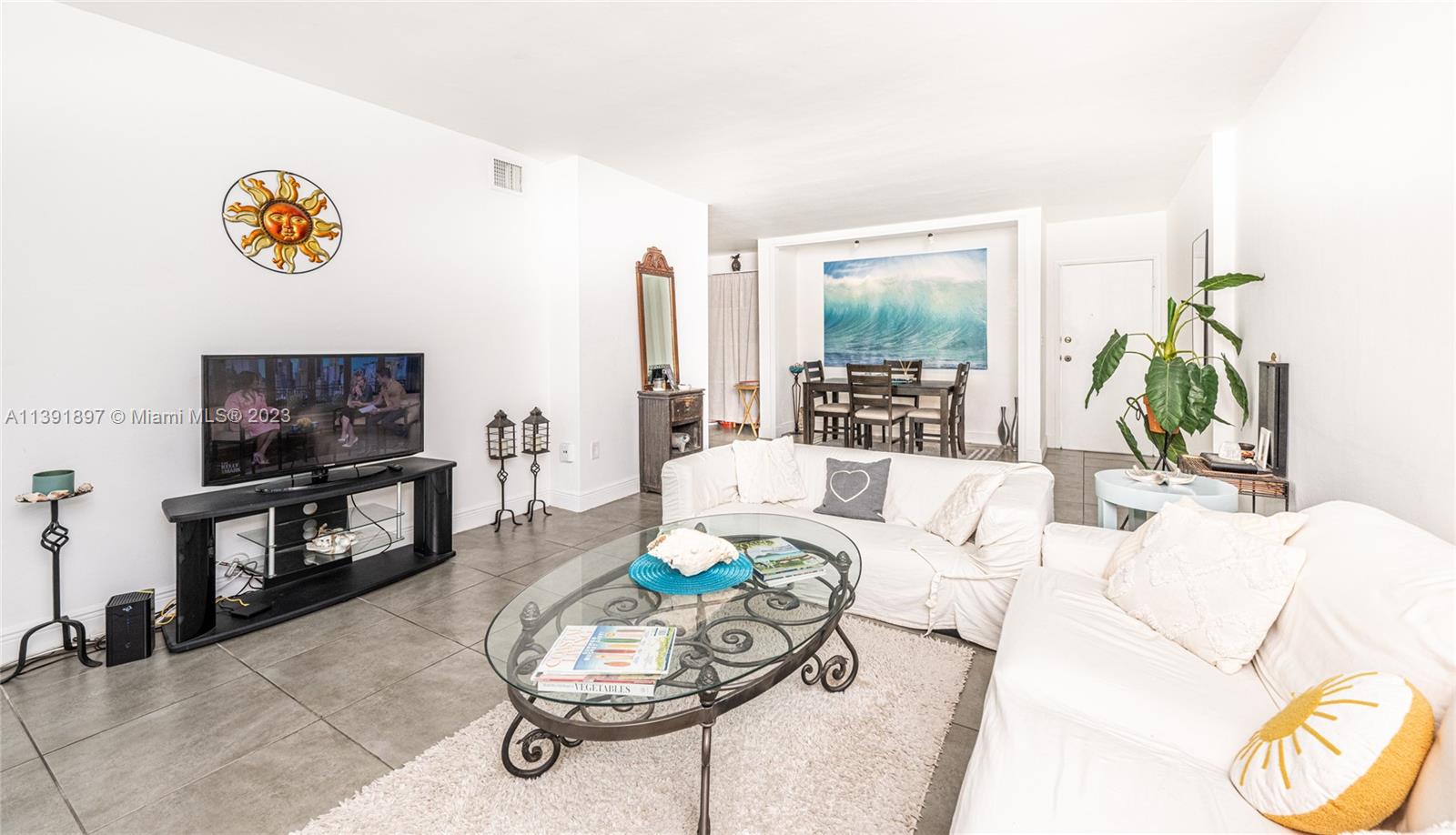 Introducing for Sale rarely available cozy & spacious 2/2 with Washer/Dryer inside, tiled throughout, located in a boutique 4-Story Building/w Garden Court Yard Views in the heart of the Surfside, in a walking distance to the Beach and the shopping plazas. See Brokers Remarks for the Showing Instructions.