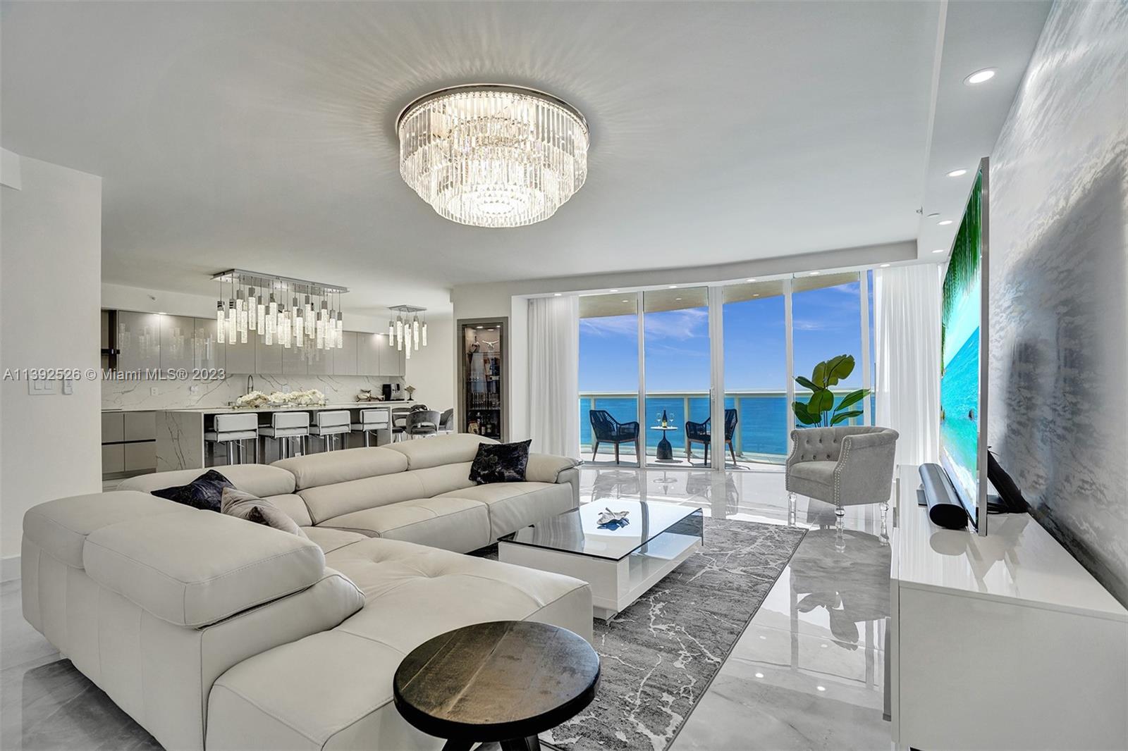 Elegance meets extravagance in this completely reimagined sky high residence! Walk into the new construction type high end finishes and upgrades in the well established Ocean IV landmark building in Sunny Isles. Take pleasure in watching sunrises and sunsets from the multiple terraces or the luxury of the lavish soaking tub. Call this one of a kind absolutely unique condo with over 3000 sq feet of pure luxury your home. Come to see it to fully appreciate the extent of the effort put forth. Inquire about the option of purchasing fully furnished.