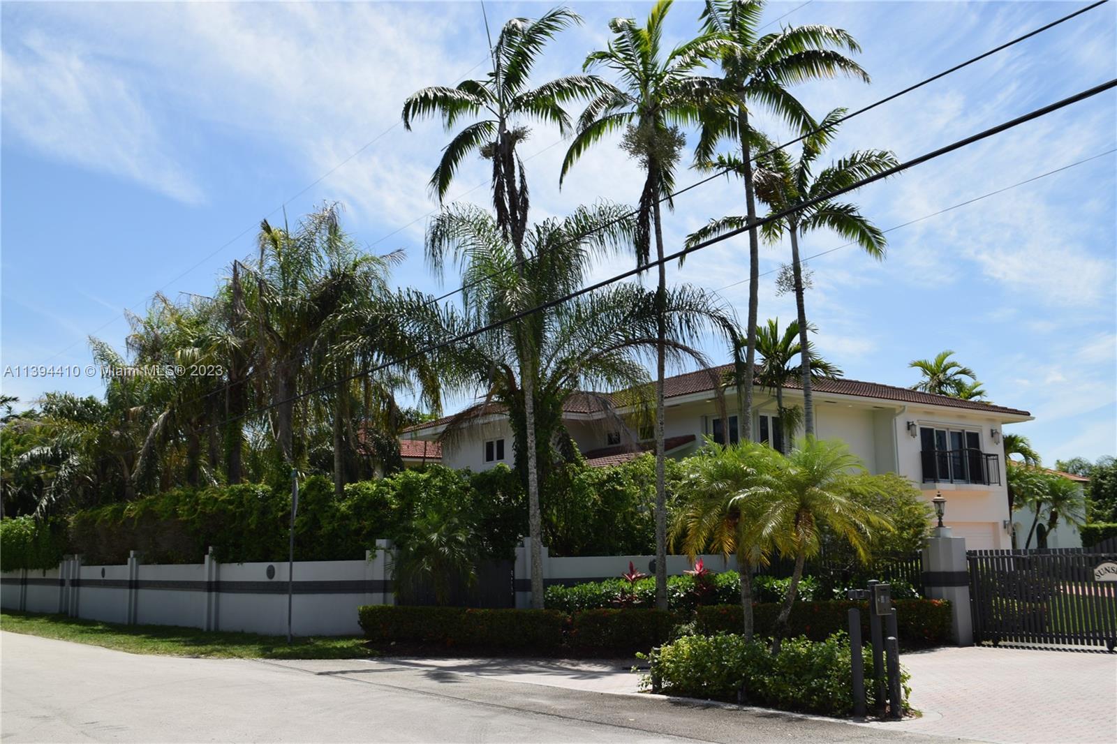 Location! Location! Grand spacious home in coveted 10 homes gated community of Sunset Dreams. Large bedrooms with open living areas are perfect for entertainment. Marble floors, walk in closets, island kitchens, 2 car garages.  Covered patio over looking  pool.