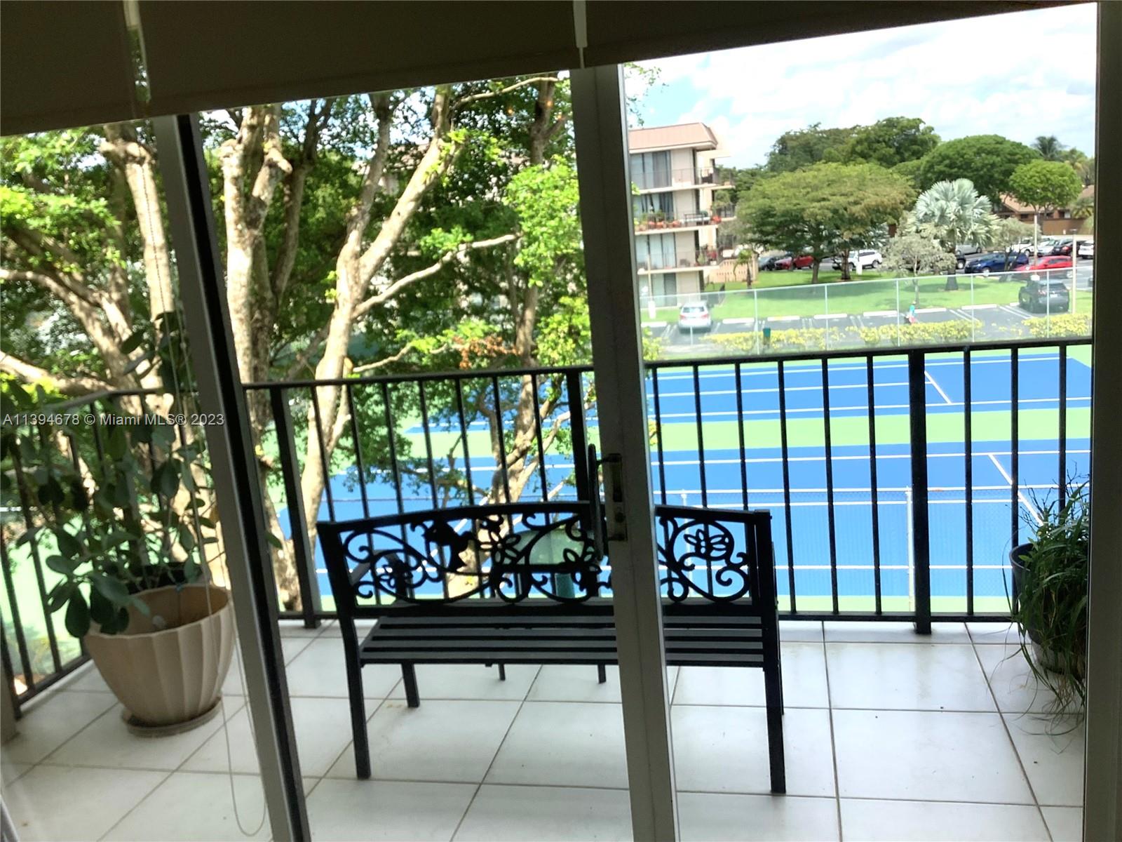 GORGEOUS BRIARWINDS 2/2 CONDO OVERLOOKING THE TENNIS COURTS.  LOCATED CLOSE TO THE FALLS SHOPPING CENTER.  FULLY TILED THROUGHOUT, SPLIT BEDROOM PLAN WITH TONS OF CLOSET SPACE!  ALL WHITE KITCHEN W/STAINLESS STEELE APPLIANCES.  BOTH BEDROOMS AND MASTER BATHROOM HAVE IMPACT WINDOWS!  ENJOY THIS BEAUTIFILLY MAINTAINED COMMUNITY WITH POOL AND RECENTLY RESURFACED TENNIS COURTS.  LOTS OF GUEST PARKING SPACES AVAILABLE. EXCELLENT OPPORTUNITY!