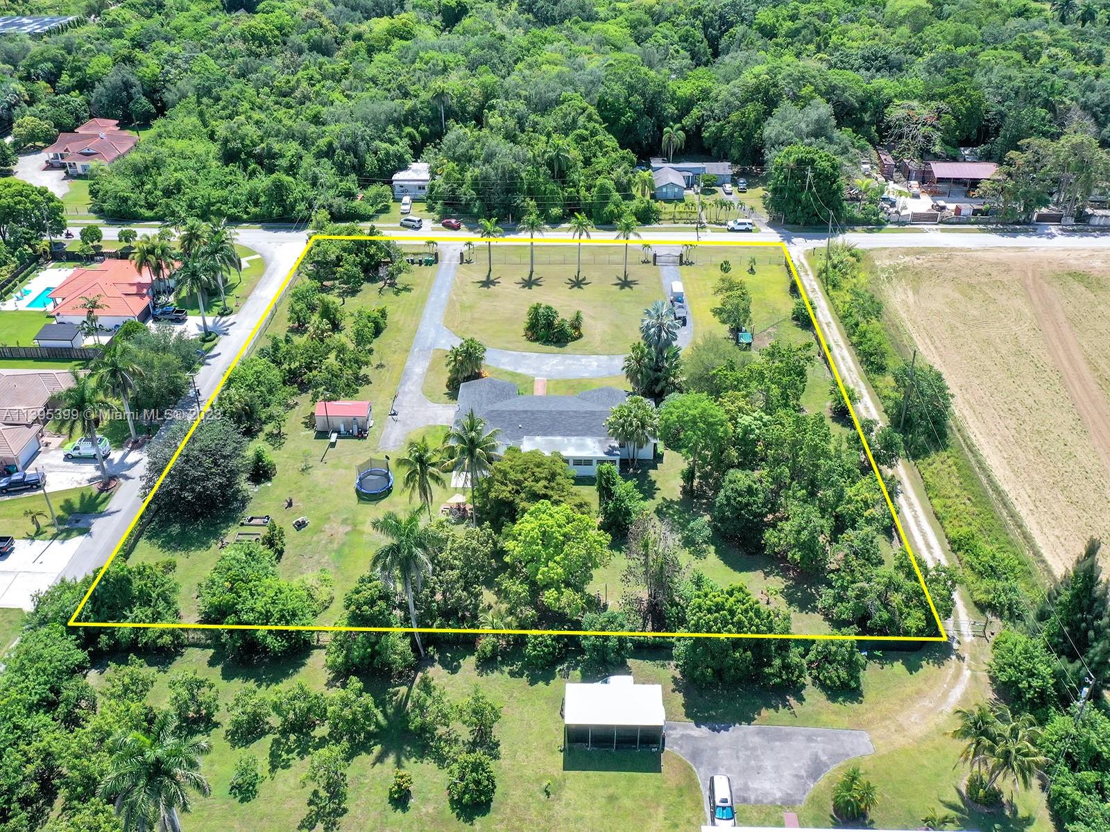 A  2.31- acre property that provides a few excellent options: can be subdivided into 3-5 builders lots; suitable for ALF (Adult living facility) a daycare, nursery, a very large family, or any other business that requires a lot of space.
Very convenient and beautiful area close to Florida turnpike just off 288th St/ Biscayne & Krome avenue.
This understated 5/4 residence includes formal living & dining areas  , very large office space, a huge indoor patio 
  ,large kitchen, master & junior master suites, mother-in-law quarters, and lots of closet space throughout the home .
New roof (2020) granite countertops, two large sheds, new well pump, as well as mature avocado ,mango, lychee, longyan coconut and other trees.