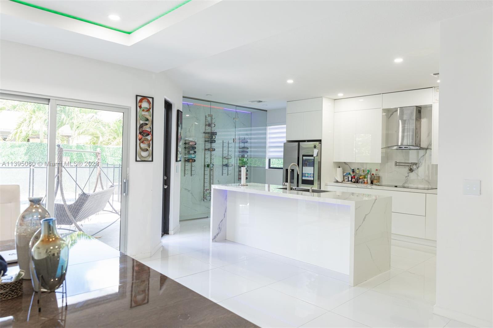 Renovated with modern taste, this property is located at the highly sought after Silver Palms community. This 5 bedroom, 3 bath property with Pool. Just to mention a few of the property amenities, two car garage (AC Split installed in garage), smart home throughout with Ipads that control lighting and music throughout. Zebra roll-down shades with blackouts, smart kitchen appliances, wine room, koi pond under stairs, Impacted Rated Sliding door that gives a beautiful view from the living room to the pool. One bedroom with one full bath downstairs. Read broker remarks for showing instruction.