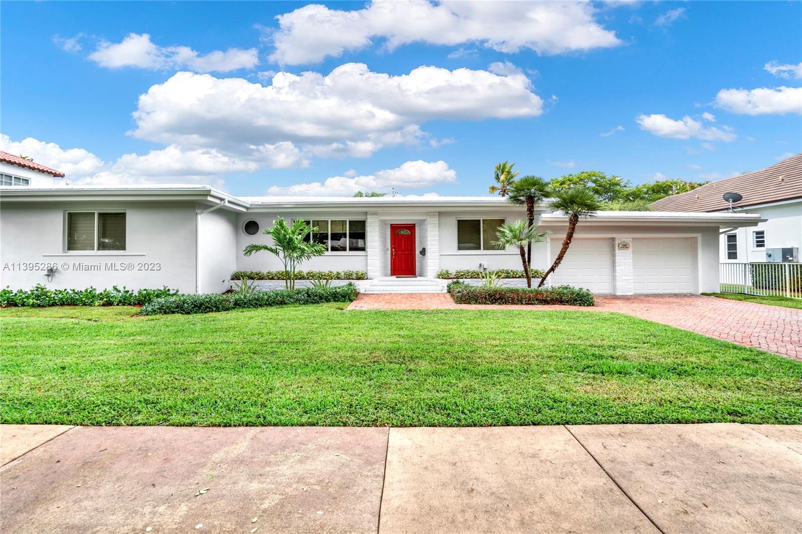 Elegant and well maintained 3 bedroom 2 bathroom home on an oversized double lot with a 2-car garage. Real wood floors throughout the property offering a formal living room, formal dining room, family room, and reading nook. Remodeled kitchen is light and bright with white shaker cabinets, granite counters, and stainless steel appliances. Hunter-Douglas window treatments throughout cover impact-resistant windows. Freshly painted outside and inside. New landscaping added and a large mango tree sits in the middle of the back yard, and lawn maintenance is included in the rent. Available starting June 1, 2023.