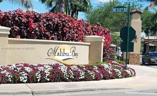 Don't miss the opportunity  to live at MALIBU BAY community! Discover this charming and meticulously maintained gated community, guard at the entrance. This comfortable floor plan has 2 bedroom, 2 bathroom, porcelain tile, new granite counter top, washer and dryer in the unit. Conveniently located on the second floor, parking and the mailbox are just a short distance from the unit. Easy to show.