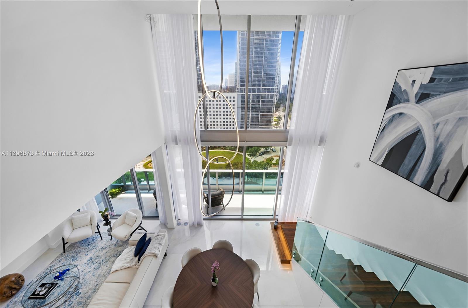 Fully remodeled unit with more than $250,000 in upgrades. High end kitchen, appliances, bathrooms and tile floors. Luxurious 2 bedroom/2.5 bathroom + Den (can be converted to extra bedroom) in the iconic Epic building. 5 stars features including full smart equipment for the lights, sound and speakers on every room, ac and more. Assigned parking and extra storage outside of the unit. 24/7 security. Semi-private elevator. River, bay and city views. Professionally designed by Addison house and Natuzzi. Highest townhouse floor.