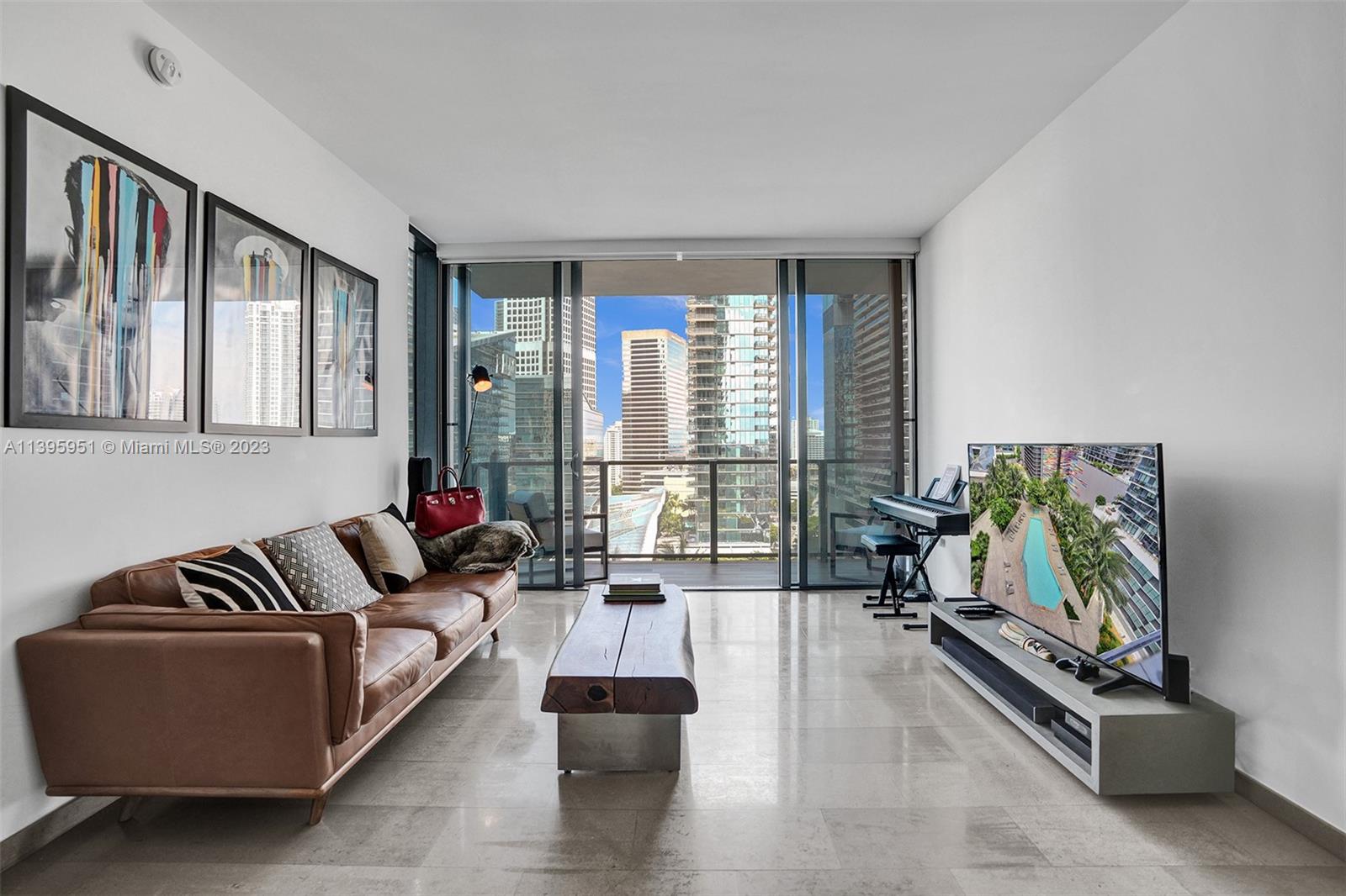 The best of South Florida, right at your doorstep. Acting as a direct extension of Brickell City Centre, Rise provides its residents with easy access to a variety of shops, restaurants and bars & is one of the most sought-after places to live in Miami. This stunning 2 bed/2.5 bath unit features high ceilings & floor to ceiling glass doors throughout, filling the space with natural light, creating a bright and inviting ambiance. The modern open kitchen is a chef's dream, equipped with Bosch appliances, Italian cabinetry, a wine cooler, and ample storage. Both bedrooms feature beautiful en suite bathrooms, oversized walk-in closets with built-ins, & black-out shades. The spacious terrace is the perfect place to unwind and take in the unparalleled views of the city skyline and Miami River.