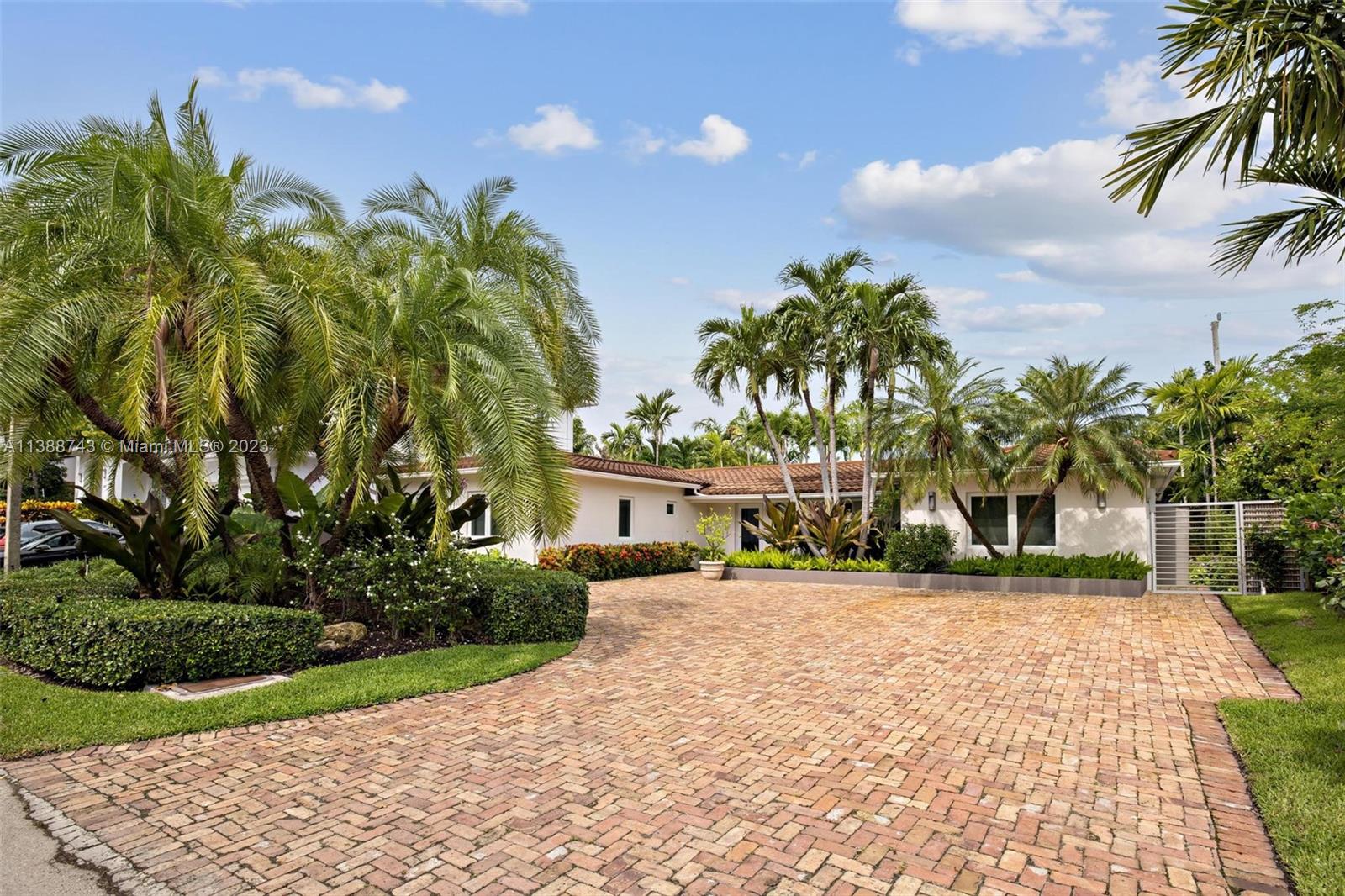 Welcome to this exceptional residence located in the prestigious Key Biscayne community. This magnificent home boasts 5 spacious bedrooms and 4.5 luxurious, all in-suite bathrooms, for utmost comfort and privacy. Step inside and be captivated by the elegance and charm of this meticulously designed property. Open floor plan seamlessly connects the living spaces, creating a sense of flow and abundance throughout. With a focus on quality and attention to detail, the house showcases top-of-the-line finishes and craftsmanship. 

The heart of the home lies in its beautiful kitchen, featuring modern appliances and ample storage space. The stunning white quartz countertops add a touch of sophistication, making this space perfect for both everyday living and entertaining guests.