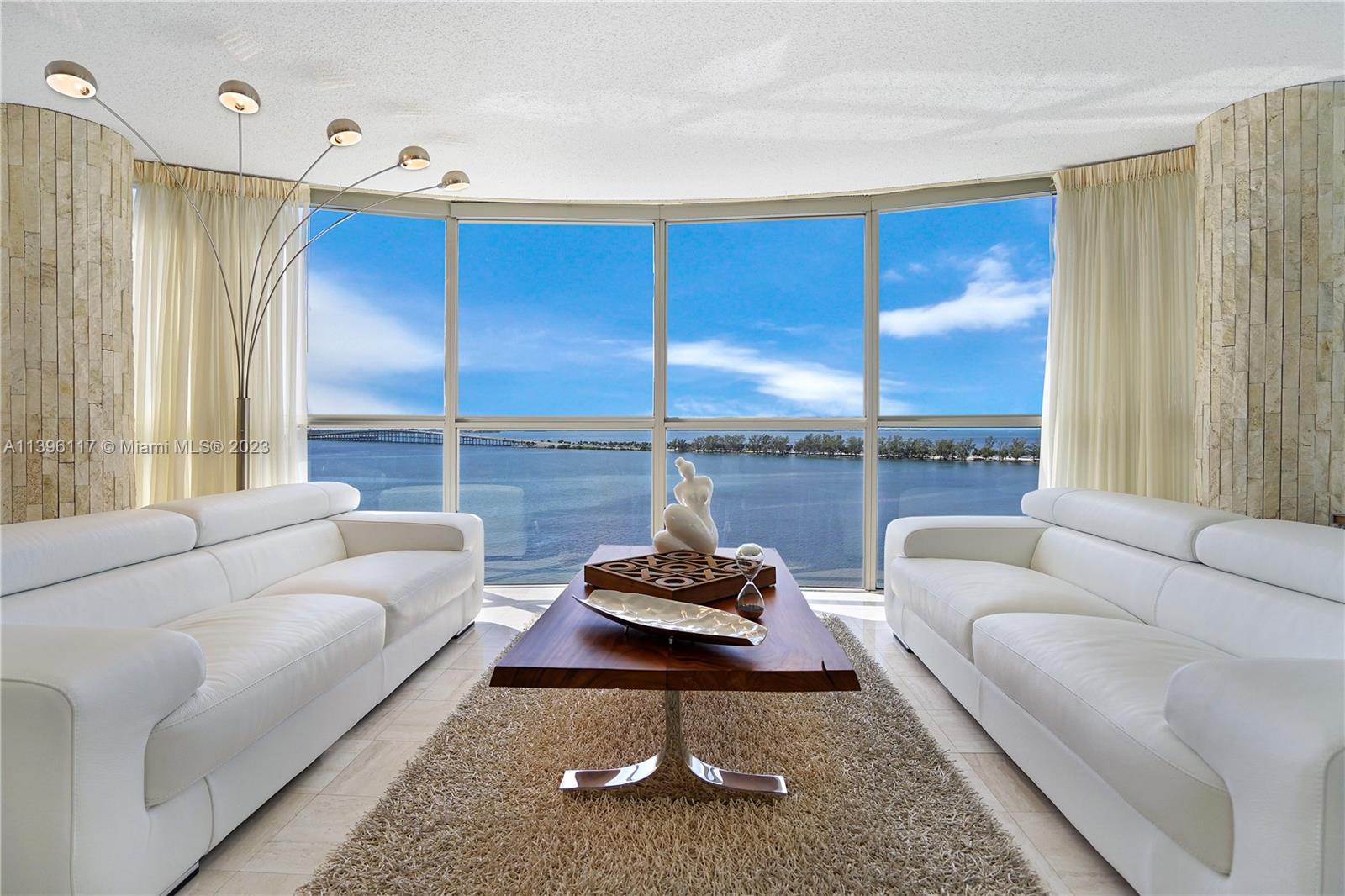 Breathtaking 180 degrees of uninterrupted views of the Biscayne Bay landscape from the living-dining room floor-to-ceiling glass walls. Located within one of the most iconic Miami landmark buildings (Miami Vice & Scarface), in the highly desirable Brickell corridor, the award-winning Atlantis building was designed by renowned architect Arquitectonica. Full resort-style amenities include a bay-side heated lap pool, tennis court, gym, sky deck Jacuzzi. This beautiful, spacious & bright 3 bathroom & 3 bath unit features foyer entry, shiny marble floors throughout, laundry room, walking closet. Enjoy the blue skies, bay & city views, from the balcony w/ access from your bedroom and breakfast area. Conveniently located near to I95, Key Biscayne Beach & dynamic life in Downtown. See Attachments.