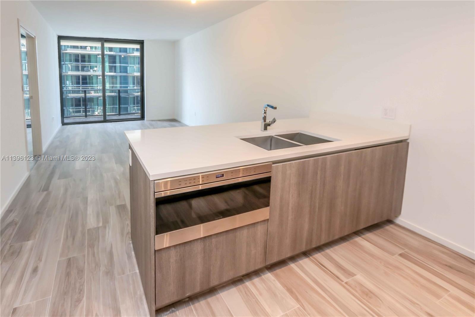Welcome to your new home in the SLS Lux in the heart of Brickell. This one bedroom plus den offer the ultimate in luxury living. From the moment you step inside your foyer from your private elevator, you'll be greeted by views of the city. The unit boasts floor-to-ceiling windows, allowing plenty of natural light to flood the space. The modern and spacious living area seamlessly flows into the open kitchen, complete with top-of-the-line appliances. The bedroom features a spacious layout, walk-in closet, and a ensuite bathroom. The den offer a flexible space that can be used as an office or guest room. The SLS Lux offer an array of world-class amenities, including a fitness center, spa, swimming pool, and rooftop terrace with stunning city views. Located in the heart of Brickell.