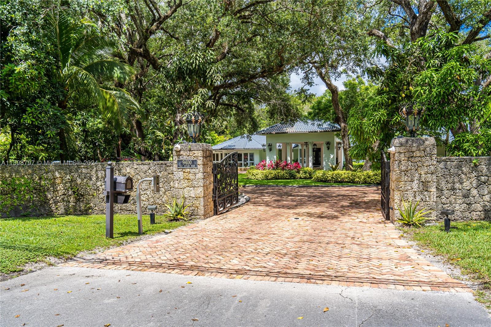 Welcome to Villa De Old Cutler. This luxury one story estate nestled on 1.51 lush acres located in Iconic South Coral Gables. This ornate home combines the charm of Old Miami with modern amenities. The property features 8,804 sq ft, 6 bedrooms, walk-in closets, 6 bathrooms and 2 guest bathrooms. The property offers a stunning gourmet chef’s kitchen with a cooking island, state of the art stainless steel appliances, large Subzero double-door freezer and refrigerator, and wine storage. The family room boasts a spacious wet bar, perfect for entertainment. Experience the best of Miami living with covered terraces overlooking a large pool with a waterfall. The outdoor area features include a barbecue, fence, lush landscaping, and impact doors with great natural light .