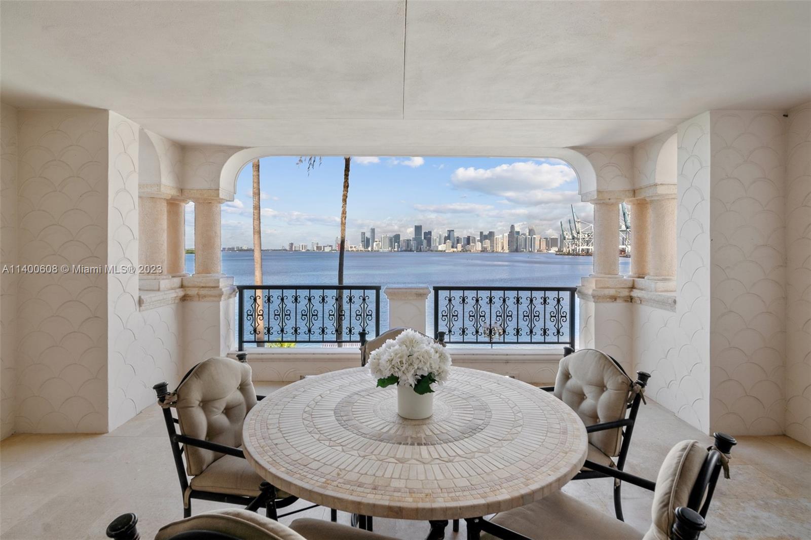 Pristine pied-a-mer, this spacious 2/2.5 unit has all the attributes of a luxurious yet comfortable home away from home.  Cozy living areas, sprawling master suite w/ double door entry.  Entertain guests in the deep, wide terrace overlooking the Miami skyline & its mesmerizing sunsets. Second BR/guest suite has its own private entrance.  Feat…Marble flooring throughout, huge private gated courtyard entry, breakfast room.
