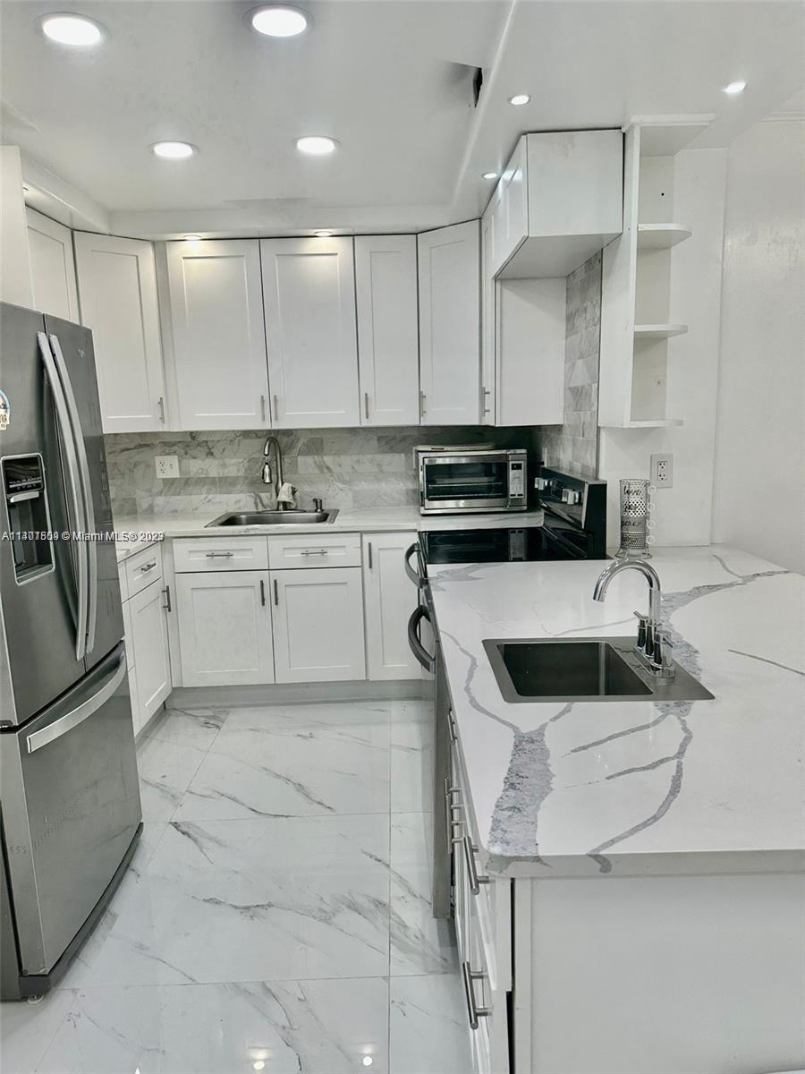 Photo 1 of Olympus Condo Phase Apt 703 in Hallandale Beach - MLS A11401509