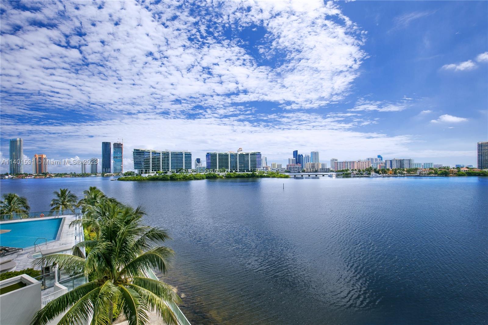 Outrageous and elegant Steven G designer condo with endless water views. Take a private elevator to this completely redone high end pad with exquisite finishings and $500k in upgrades. Sold furnished. 4 beds/4.5 baths. "4th room Maid's quarters". 24x48 slab porcelain tiles, high ceilings + 2 large balconies-535sqft. Chef's kitchen has Wolf double ovens, gas cooktop & Bosch builtin coffee maker. Master suite boasts a large closet with chandeliers, midnight kitchen and a luxurious master bath with walk in shower & separate soaking tub. Smart home technology- custom lighting, A/C, surround sound, electric blinds & more. Laundry room + storage. Built in Summer kitchen with BBQ. Resort style amenities include infinity waterfront pool, spa, gym, yoga, cafe & valet. Storage unit & 2 parking.