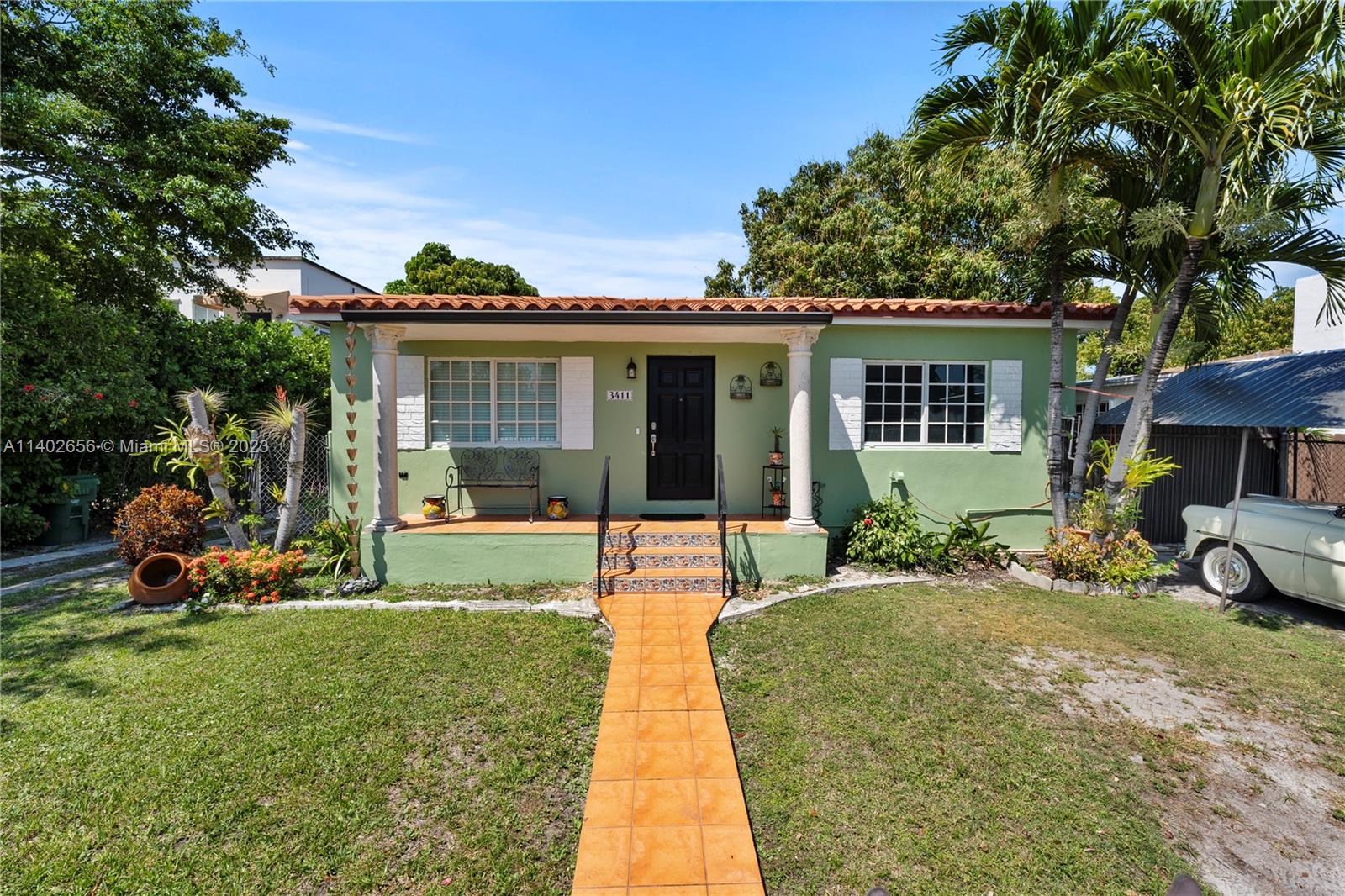 Gorgeous 2/2 home with 1/1 in-laws quarters in the heart of Miami. The 2/1 original home features hardwood floors, SS appliances, a laundry room and a spectacular yard with outdoor full bathroom, space for pool, boat or RV, and summer kitchen. This home had the electricity and plumbing re-done in 1999,  The newer built in-laws quarter (with permit) features a spacious 1/1 tiled throughout, its own AC and water heater. Property only has 1 meter. Perfect home for an investor, large family, or family who is looking to generate additional income. This home is close to downtown Miami, coral gables, the beach, shopping, great restaurants and excellent schools.