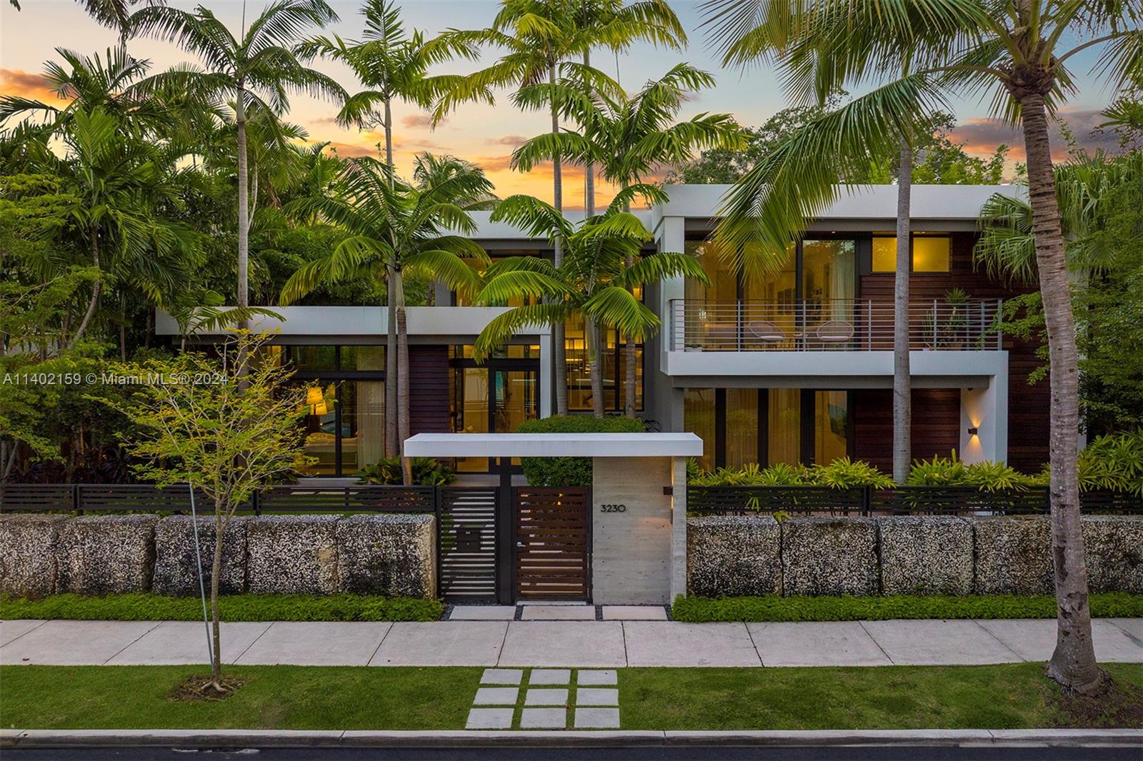 Indulge in the ultimate Coconut Grove lifestyle in this extraordinary modern estate by renowned architect Charles Treister. Perched atop a ridge 21 ft above sea level and surrounded by a lush garden, this unique Tri-Level home seamlessly blends indoor and outdoor spaces for a tranquil tropical experience. Boasting an array of meticulous details and exquisite craftsmanship, you&#039;ll be captivated by a spectacular floorplan with 7 bedrooms and 7/2 bathrooms, rare to find basement w/ A/C, separate guest suite apartment, elevator, and exquisite finishes throughout. Experience an outdoor oasis with glowing pool &amp; spa, covered terrace, summer kitchen and outdoor shower. This modern smart home offers it all with a full house generator, 2 car garage in desirable North Grove and prestigious schools.