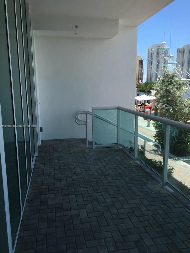 Sunny Isles Beach, walk 5 min to the Ocean, amazing waterfront 2 story loft ground level, 2 bedrooms+ large den+3 full bathrooms, 1 bedroom and 1 full bath on first level, water view from every space, high ceilings, impact windows and doors, luxury building amenities including Full Marina, tennis court, fitness center, sauna/steam, pool, party room, pet friendly, excellent location and school.