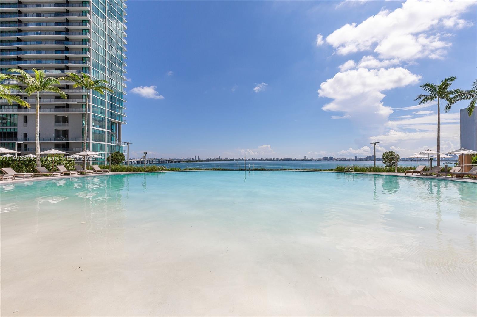 Amazing water views and best amenities at the Luxurious Paraiso Bay! Private elevators takes you to this modern and classy 4 bedroom / 4.5 bathrooms apartment. It features gray ceramic tiles, backsplash, Armadi Closets with mirrored sliding doors, upgraded 2-zone AC, blinds in living room, blinds and blackouts in all bedrooms (electric in living room, master and junior master), beautiful neutral wallpaper recently installed in all walls, doors and baseboards recently painted. This is one of the few units that has 2 parking spaces! Paraiso Bay offers everything the most demanding client could ask for: beautiful pool, state of the art gym, kids room, game room, community room, wine lounge, cigar lounge, bowling, etc . Excellent location, great access to everywhere!