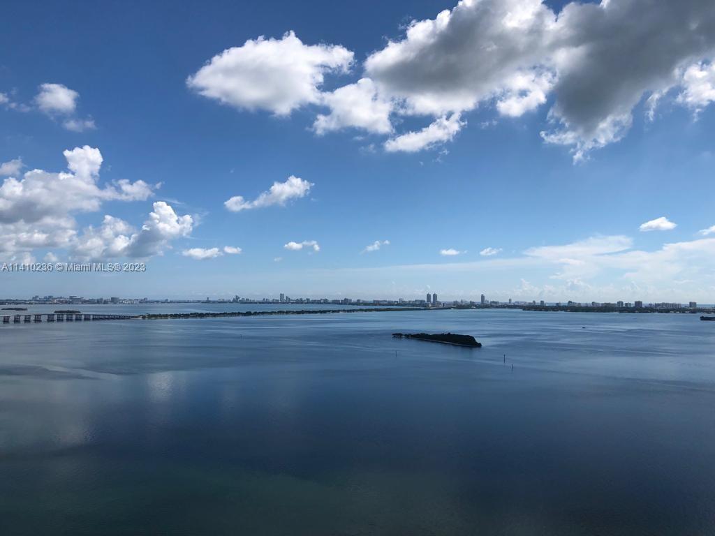 Beautiful unit with direct bay view, floor to ceiling windows, balcony with glass railing. Top of the line appliances, granite countertops, marble floors, walk-in closets. All amenities of a luxury high rise, pool lounge area, recreational room with direct bay view, valet. Concierge and much more.