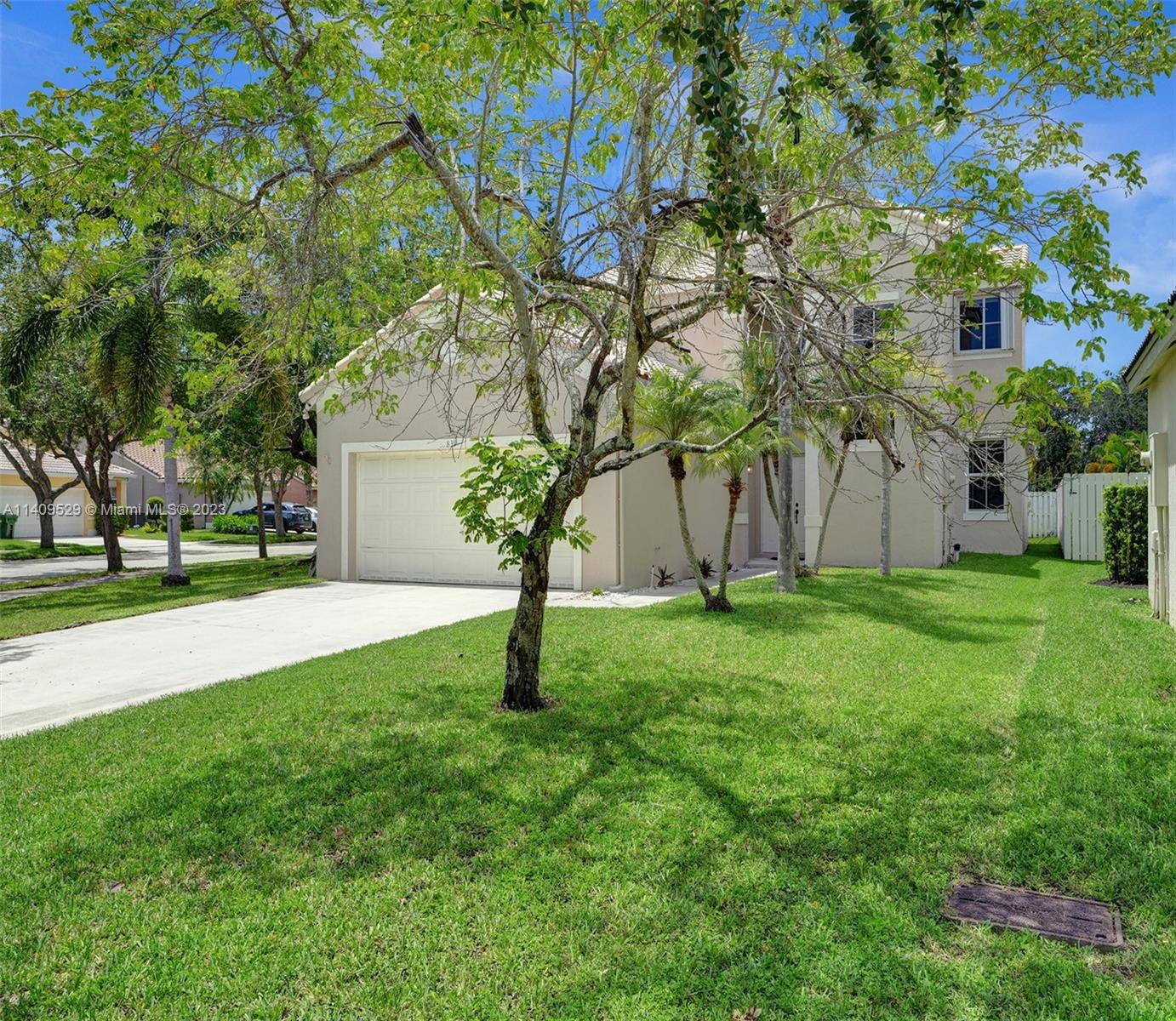 Beautiful corner lot, Bright & Spacious 4 Bedroom 2.5 bath, large yard with room for a pool. This Spanish-style home features MASTER ON 1ST FLOOR, NEW ROOF, NEW ENERGY EFFICIENT IMPACT WINDOWS, NEWER WATER HEATER, FRESHLY PAINTED, Remodeled kitchen w/ Stainless appliances and granite counters tops. Quiet, Tree-Lined neighborhood.  Well-run guarded-gated community with great amenities like pool, basketball/volleyball courts, and Tot Lot. A+ rated schools, close to shopping center, restaurants, parks and highways. Amazing opportunities for kids sports, recreational and cultural activities.