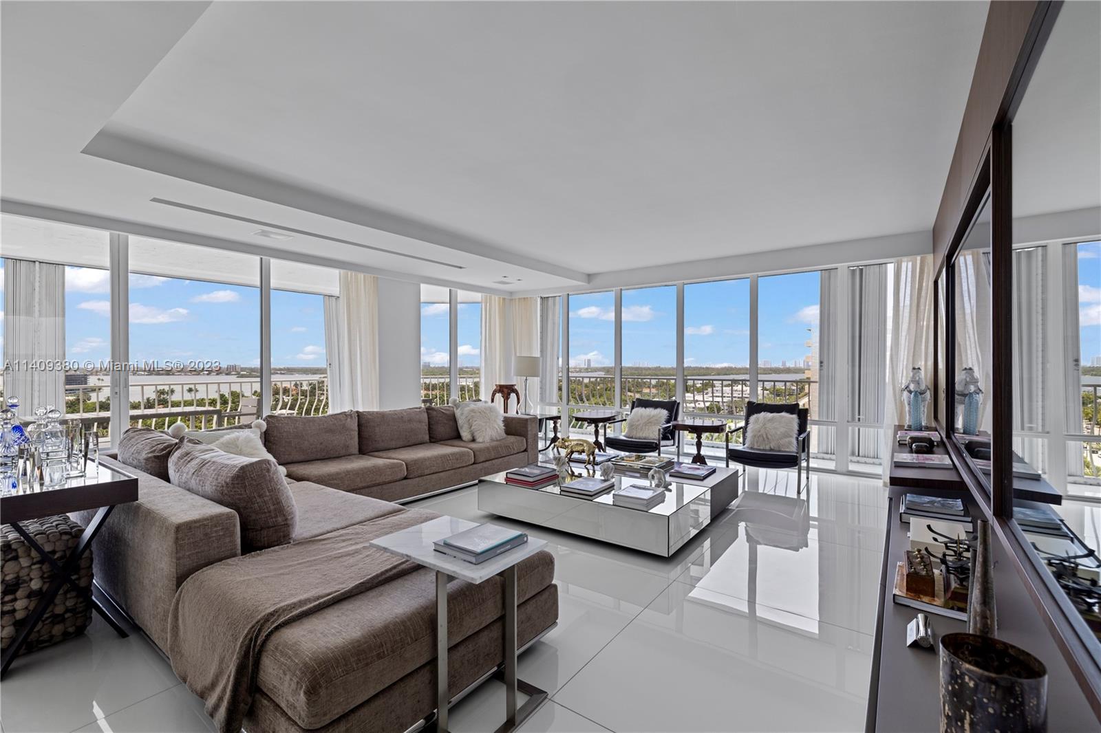 This fully renovated Bal Harbour apartment offers a spacious living space of 3,300 square feet. With 5 bedrooms and 5 bathrooms, a large dining area, and a comfortable living room, you'll have ample room to enjoy the luxurious atmosphere. The building itself is equipped with fantastic amenities, including a pool, and a "cabana" is available for rent. The apartment boasts breathtaking views from its elevated position, providing unobstructed panoramic vistas of the bay and city. The building also features a health spa, a fully equipped gym, an elegant restaurant, and a tennis court. Plus, it's conveniently located within walking distance of the renowned Bal Harbour Shops. This Bal Harbour apartment truly offers a home in the sky with all the luxury and convenience you could desire.