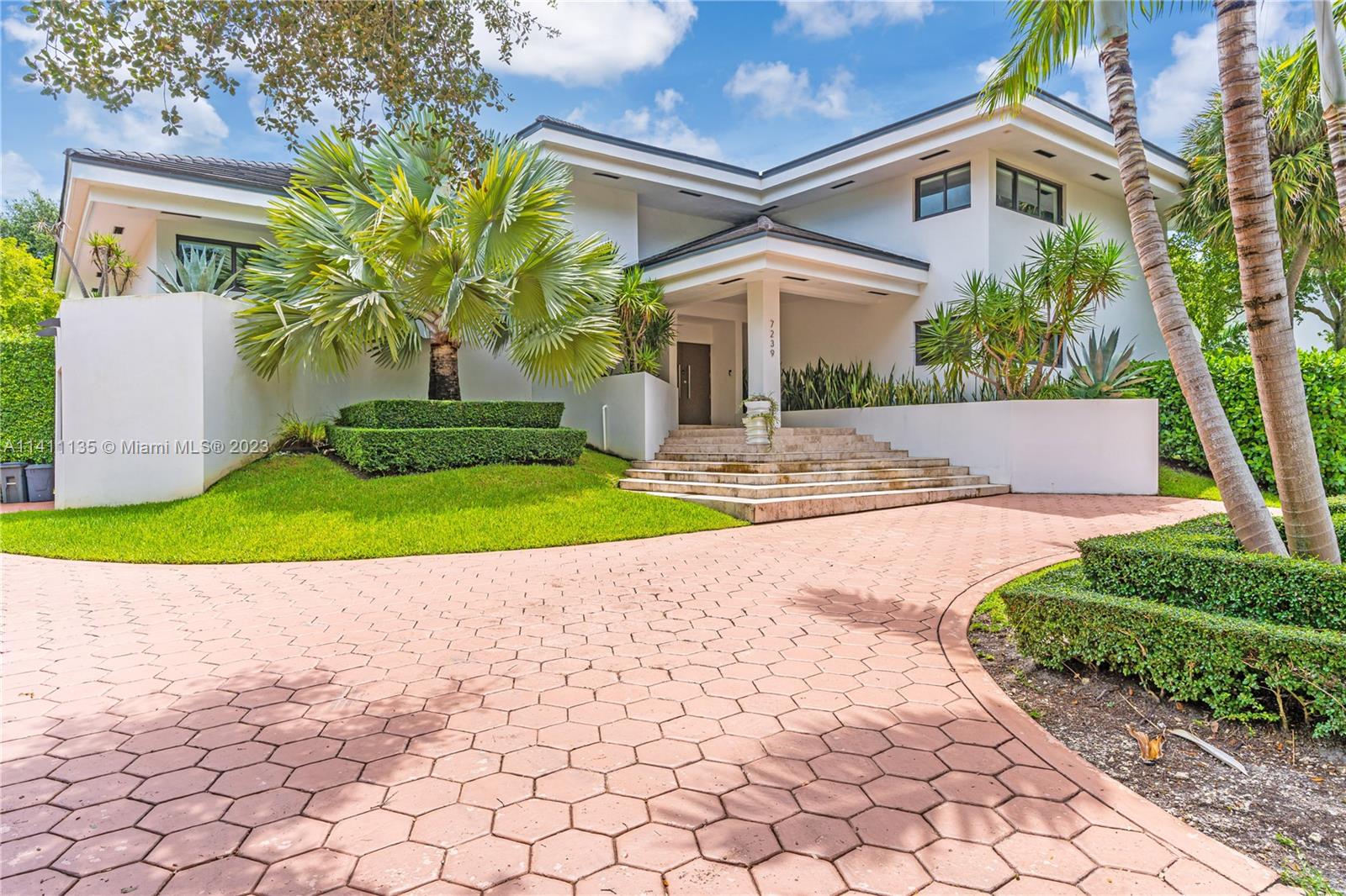 Amazing opportunity to live in the prestigious community of Cocoplum. This 5 bedroom 4.5 bath home is tastefully renovated and fully turn-key. High end kitchen comes with an oversized island, wine cellar and top of the line appliances. plenty of sitting areas throughout the house along with an outdoor bar and private pool make this one perfect to entertain. Enjoy the tennis courts, pool, gym, club house, basketball and volleyball courts along with the marina all within the secure gated community.