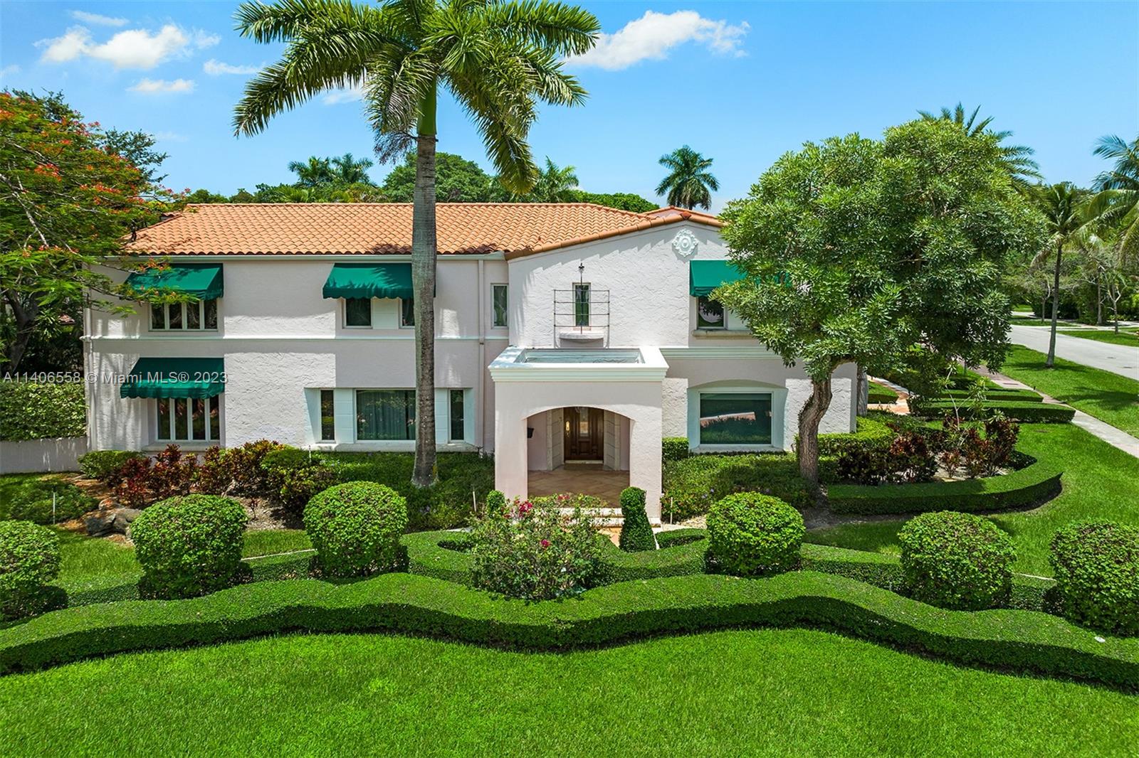 Exquisite and impressive 12,327 SF luxury estate with 7 bedrooms, 8  bathrooms and 2 half-bathrooms, on a 31,529 SF lot in Coral Gables. A grand foyer leads to an open layout with sizable rooms and custom architectural details, two formal dining rooms, and a gourmet kitchen with floor-to-ceiling cabinetry,  large center island, pantry, and top-of-the-line appliances. Includes a spacious primary bedroom suite, well-appointed office/library, game room, and elevator. Beautiful arched French windows/doors open to stunning outdoor areas with tall palm trees, manicured grounds, and a large pool with a brand new heater. Ample parking with a 4-car garage and driveway; new roof and AC units in 2019. Within close proximity to fine dining, high-end shopping and entertainment venues.