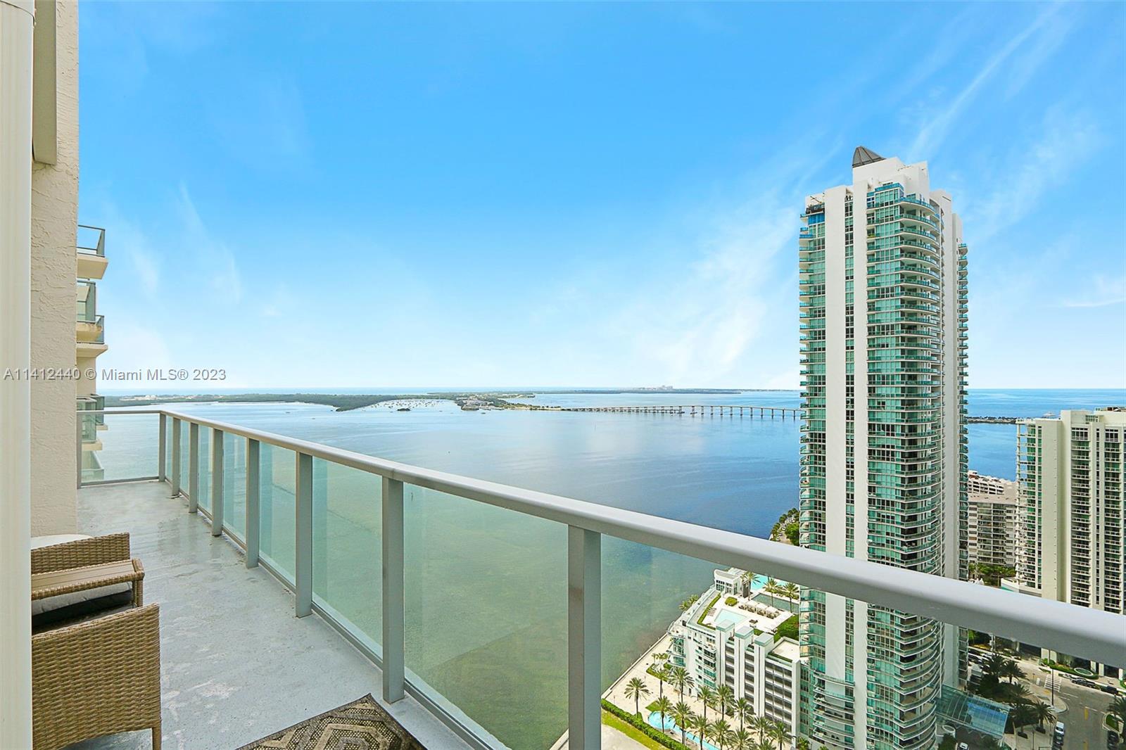 Breathtaking 2BR/2BA Corner Unit Penthouse at The Mark on Brickell! This fabulous sky home features brand new $50k sound proof impact windows and pocket doors with unparalleled views of the water and the Brickell skyline. Beautiful white porcelain tile floors and upgraded modern light fixtures throughout. Remodeled European inspired kitchen with quartz counters and waterfall, stainless steel appliances and white lacquer wood cabinets. Renovated bathrooms with floating vanities, Jacuzzi tub and glass shower. Ample storage with 7 closets, washer, dryer and extended corner balcony. Maintenance includes water, cable and internet. The Mark offers 5 Star amenities including a bay front heated pool, gym, tennis court, convenience store, clubroom with pool table, Crazy About You restaurant & more!