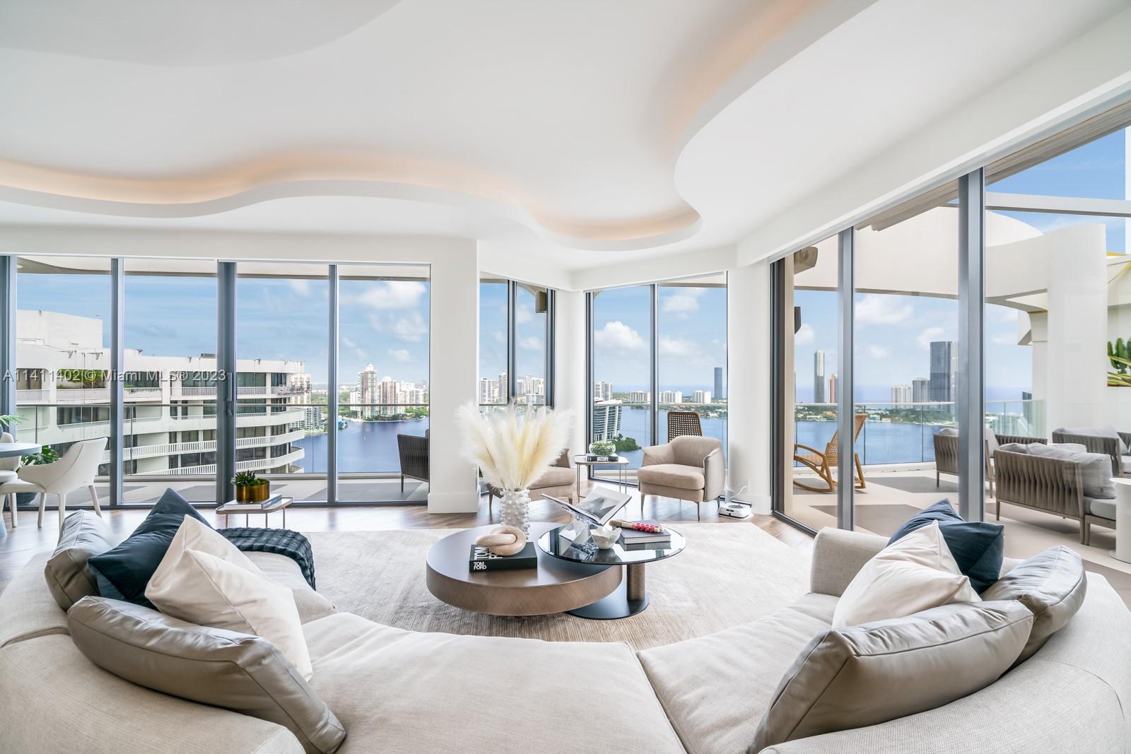 Escape the hustle and bustle of the city in the exquisite luxury corner penthouse, located at 2800 Island Boulevard, #PH03, in the prestigious Williams Island. You can enjoy both city and water views from three outdoor patios. With 5 bedrooms, 6 full bathrooms, and 4,780 square feet, there’s plenty of room for both family and friends to visit. Some of the interior features include 12’ ceilings, a 900-bottle wine cellar, a cigar room, and integrated smart home technology. Amenities on the island include 3 restaurants, 16 tennis courts, a 27,000-square-foot spa, a marina, a walking trail, a playground, a courtesy bus, and more. Do not miss out on this stunning Williams Island gem!