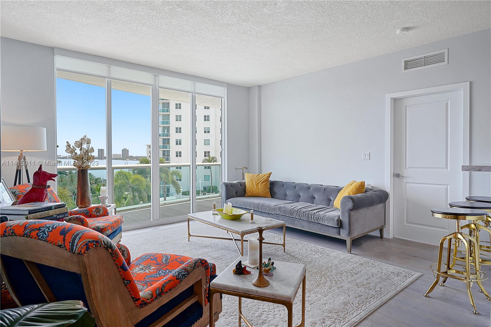 ONE OF A KIND Tranquility yet close to the action Miami-Miami Beach has to offer! This tastefully renovated two bedroom- two bathroom condo located on the island of North Bay Village boasts gorgeous water and downtown Skyline views. 360 Condo offers dock space or drop a kayak or paddleboard. Two pools, hot tub, gym, sauna, party room, ample guest parking and free valet. Impact windows, gated building, 24 hr security. Furniture negotiable.