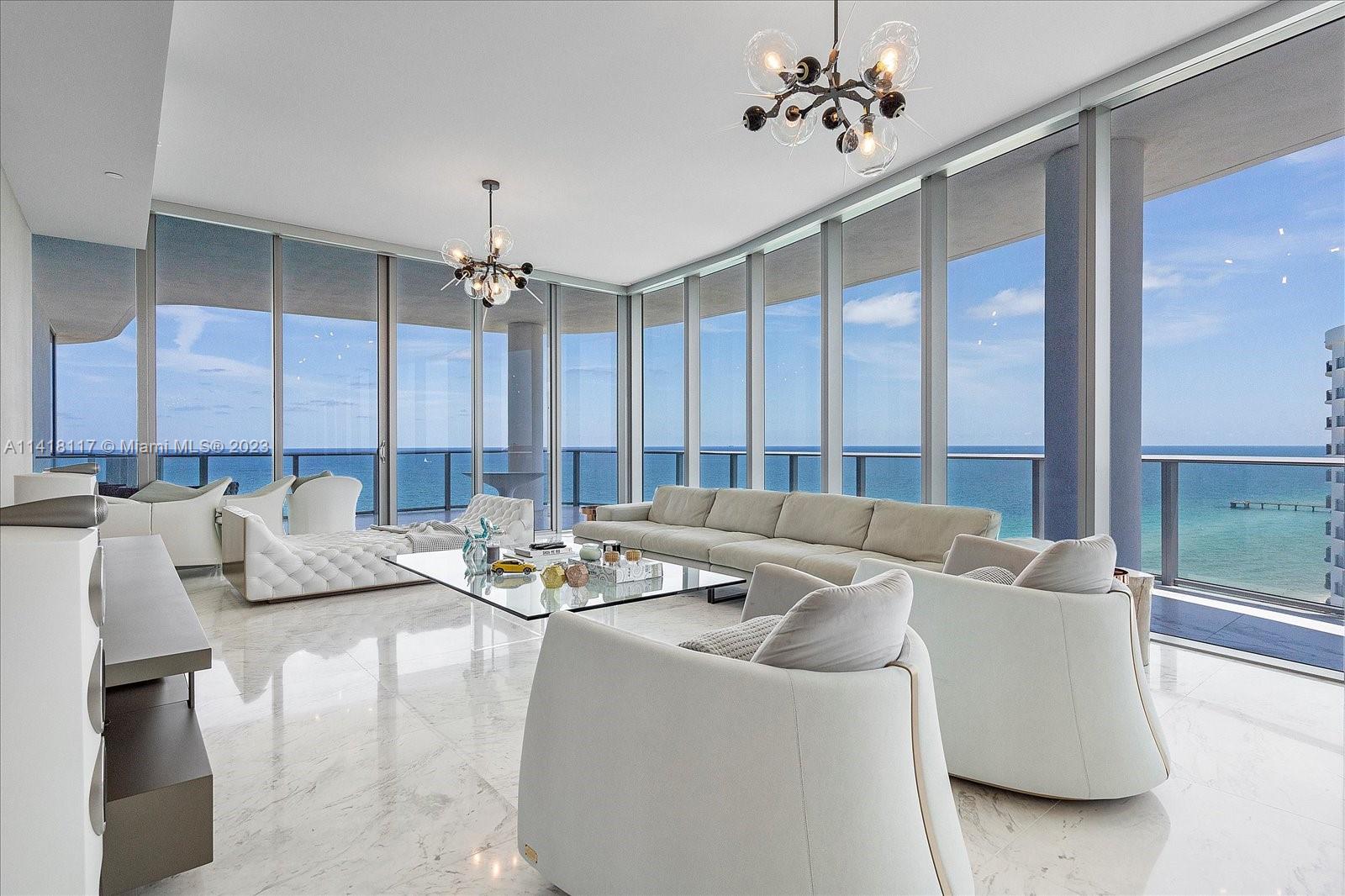 Super Luxurious apartment with the Best views! A private elevator gives you access to a tastefully furnished unit with everything you need for an enjoyable stay in the Miami beaches. Luxury amenities include: Bar/ Restaurant at the Lobby, Beach Service, Infinity Pool, High End Spa, Beauty Salon, Fitness Center, Wine Cellar and Cigar Lounge, Cinema Room and Kids Playroom.

Offered fully furnished. Nothing like this in the entire building, this 3 bedroom, 5 full & 1 half bathroom 3,340 SF unit (plus balconies)