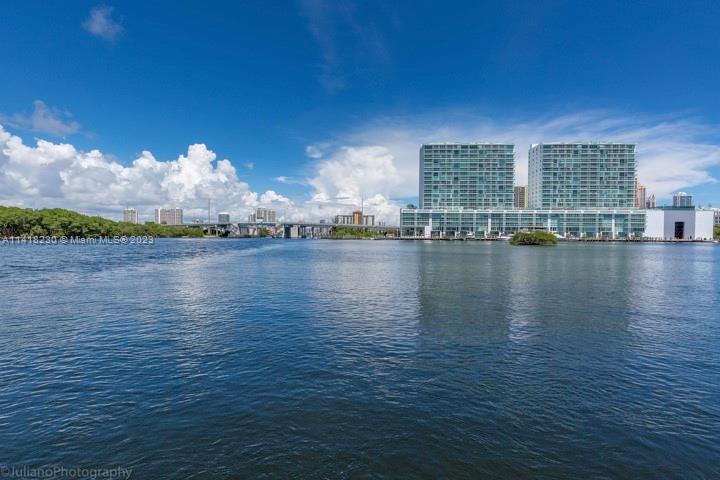 BEAUTIFUL 2 bedrooms, 1 convertible den,3 baths in a brand-new building in Sunny Isles Beach. Brand new unit. Floor to ceiling windows, water views from every room. Custom upgrades include light fixtures, custom closets, and electric shades. Comes with a fully equipped kitchen. The building has some incredible amenities including spa, gym, soft tennis court, Infiniti pool, multiple Jacuzzis, bar/restaurant, cabanas, marina with dry and wet slips.
