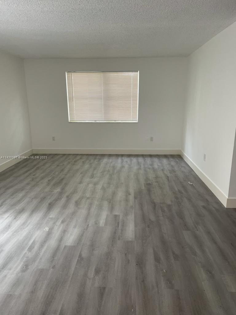 Great location, 2 bedroom 1 bath with 2 assigned parking spots. Plenty of guest parking. The community features a gym, laundry room, kiddie play ground, and swimming pool. Close to US1, close to shopping and public transportation. Live minutes from restaurants, great schools, and more. This condo is freshly painted, security and a spacious laundry facility. It is within a gated community just east of US1. This unit has been fully renovated and is in immaculate condition. We have a new apartment, brand new bathrooms, newly remodeled kitchen with quartz counter top and tile floors, and much more! Premium vinyl floors in living and bedroom areas!