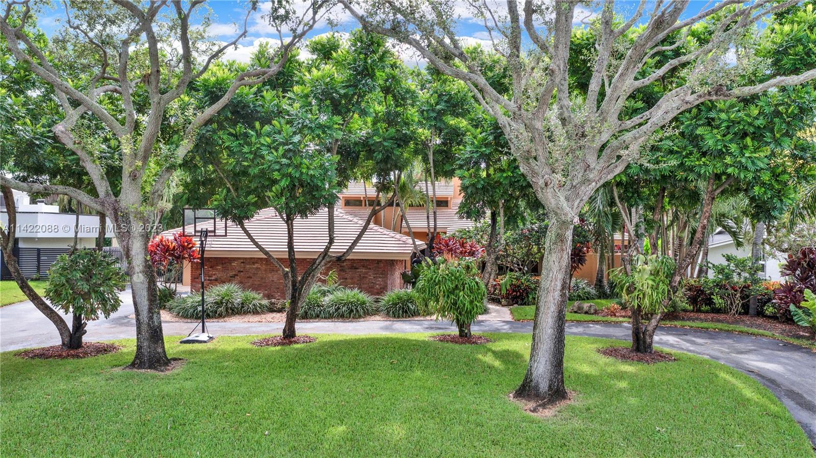 An exquisite 4 bedroom, 3 bath home nestled on almost .5 acre of lushly landscaped lot in Village of
Palmetto Bay; one of the most prestigious neighborhoods Miami Dade County. This home welcomes you
with a grand Chicago brick-walled entry opening to formal living and dining rooms, eat-in kitchen with double ovens and pantry, family room w/wood burning fireplace and wet bar, surround sound in common areas & patio, a split floor plan and all fully renovated bathrooms (one is a Cabana bathroom). Step outside and discover a private tropical oasis with meandering paths, a spacious gazebo, large deck, refreshing swimming pool and outdoor shower, and a fully equipped outdoor kitchen for alfresco dining and year-round entertaining. Let this magnificent home capture your heart!