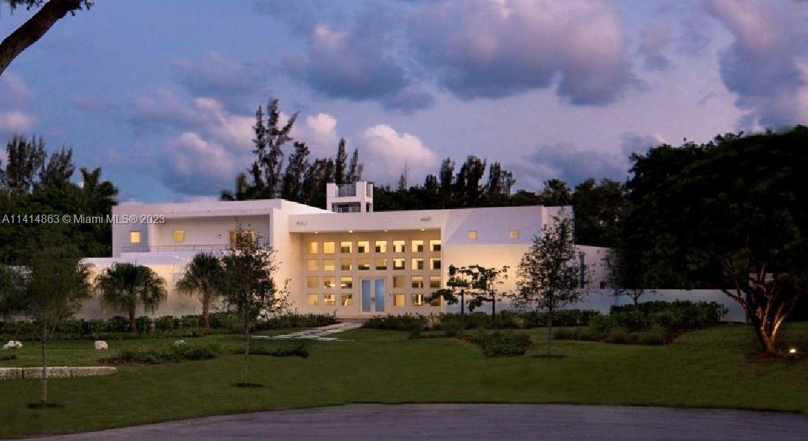 Award-winning, nearly new, all-concrete construction clad in French limestone. Overlook Bay and downtown Miami from your 35-foot tower in a park-like setting. Security staffed and guard gated. Lauded in Architectural Digest in June 2021, and previously featured in Florida Design. Pinecrest's premier LEED Gold Home. AIA COTE Award and the US Green Building Council Home of the Year. 7,526 adjusted SF with 40-foot infinity-edge outdoor living. Control shades, lights, AV, and security. Cul-de-sac. Designed to WELL Building Standards. One-of-a-kind trophy property, iconic architecture,  ideal for both executives and celebrities.