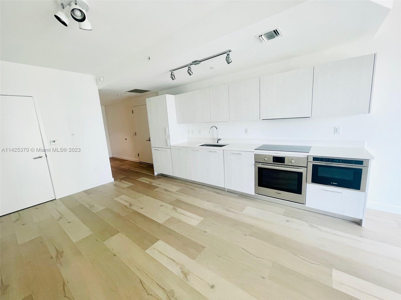 This modern 1 bedroom, 1.5 Bathroom + DEN/ Office apartment is located in the trendiest neighborhood in Miami! Edgewater is just minutes away from Design District one of the most luxurious shopping and lifestyle destinations. Unit has brand new floors throughout. 
In addition to having exclusive amenities, its located in Paraiso district with restaurants, cafes and bay front neighborhood park. Unit features spectacular Bay & Miami Skyline views. Tenant occupied, only serious buyers please.