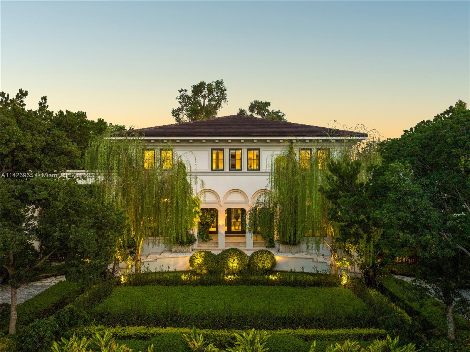 Located in the exclusive waterfront gated community of Old Cutler Bay, this 7,325sf Jorge Hernandez-designed masterpiece is where inspired design meets refined living. 7 BD, 6 BA, 2 half-baths & expansive entertaining spaces. An open-concept dining & family room w/fireplace opens onto a patio overlooking a wide canal & luxurious landscaping. A bright foyer, formal living & dining rooms, chef’s kitchen w/high-end appliances, butler’s pantry, laundry rm, office, ensuite guest quarters w/gym and maid’s qtrs are on first floor. Upstairs are 4 ensuite bedrooms, including the spacious primary, w/spa-like bathroom & large terrace. The 23,800sf property includes luxurious pool, summer kitchen, 2-car garage w/lift, whole house generator & private boat dock on 140 ft of water w/direct access to Bay.