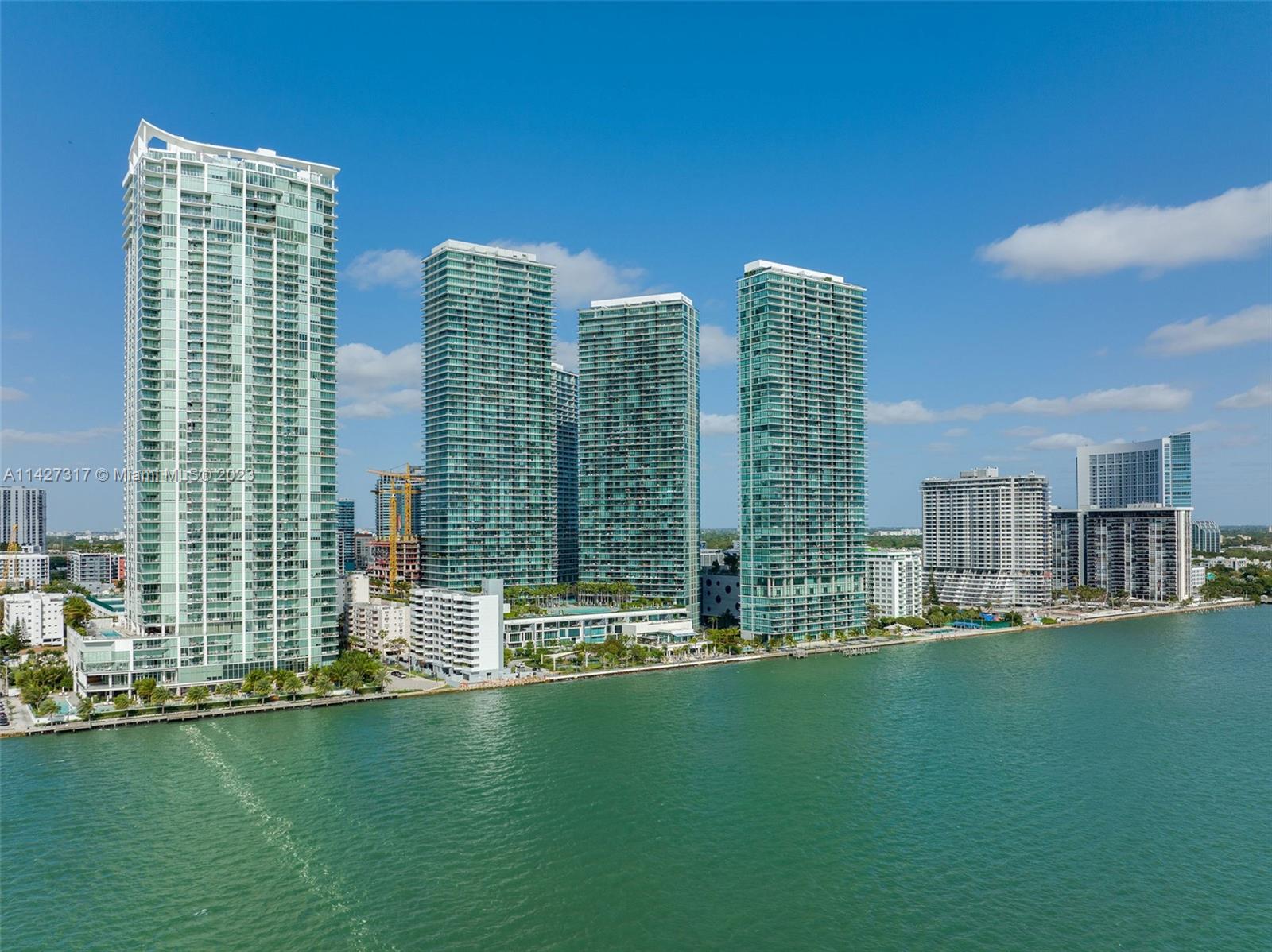 Welcome to Paraiso Bay, an elite lifestyle resort community, situated on Biscayne Bay in Edgewater. Paraiso offers world-class architectural design including elevators that open directly inside your private foyer. Sleek and spacious glass terraces that enhance the sunrise, sunsets, and direct bay views. Exceptional finishes: SubZero & Bosch kitchen appliances, Italkraft kitchen & bath cabinetry, Porcelain plank flooring. Every luxurious amenity you dream of steps from your door: Magnificent circular heated pool, state-of-the-art fitness center w/ classes, tennis, bowling, wine/cigar room, theater, putting green, children’s amenities, dog park. Amara, A Michael Schwartz restaurant with bayside dining. Exceptional 2 Bedroom 3 Full Bath + Den unit, impeccably maintained never rented. Pristine