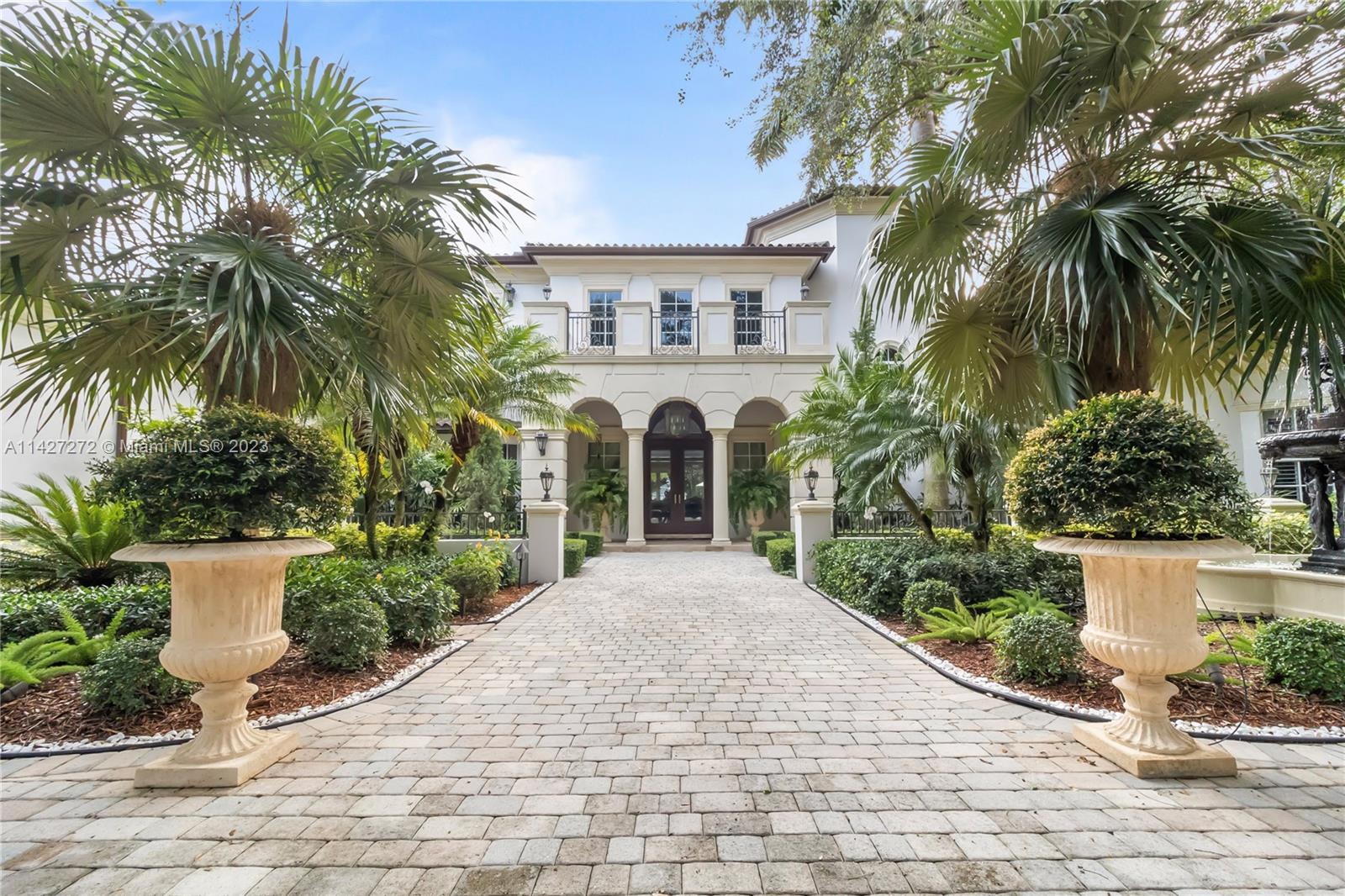 Stunning state in North Pinecrest. This spectacular and elegance custom made Mediterranean mansion sits on 1.15 acres lot. Welcomed by expansive gate entry surrounded by mature oaks trees and exquisite illumined landscaping with fountain. Elegance living space, equipped with smart lighting and sound systems include 8 bedrooms and 8.5 bathrooms. This remarkable two storage floor plan offers a large kitchen with island,  top a the line appliances, breakfast nook open to the huge family room, expansive master suite with sitting room downstairs, huge dual closets and private terrace. Intimate tea room, gym, game room,  massage room, wine cellar, sauna. Marble and wood floor. Resort style backyard, large pool, jacuzzi.. This truly unique state exude sophistication, elegance and functionality.