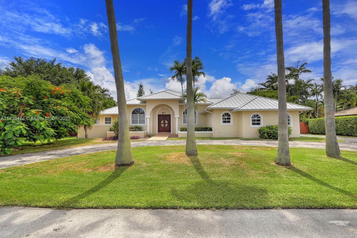 Also available for short term. Beautiful 4 bedroom 3 bathroom pool home in quiet cul-de-sac in Palmetto Bay. Grand foyer entrance with open floor plan, formal living and dining, large family room, updated kitchen with wood cabinets, granite counter tops and stainless-steel appliances with a custom-built bar. The master suite overlooks the pool area and has two large closets and an updated master bathroom. Large patio and pool area great for entertainment. Circular driveway with 2 car garage. Pool and lawn maintenance included. Amazing home in a great neighborhood!