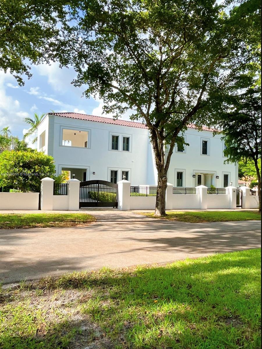 A Coral Gables corner home in a most desirable location across from the classic Gables French Village and with a charming architecture. 3BR, 3BA with a large terrace on the 2nd floor corner adjacent to the master bedroom and a similar terrace on the 1st. floor open to kitchen and dinning with additional terrace on the 2nd floor for the other rooms a total of 3500' sq. ft. It is a specially constructed structured quality consisting of poured concrete slab roof and additional Gables architectural roof and superior insulation, in addition the interior walls are concrete (no sheetrock walls.) This house was featured in the Miami Herald, 6-9-2005 titled "This house is ready for anything" "The Anti-Hurricane House." This home epitomizes strength, character and beauty in the city beautiful.