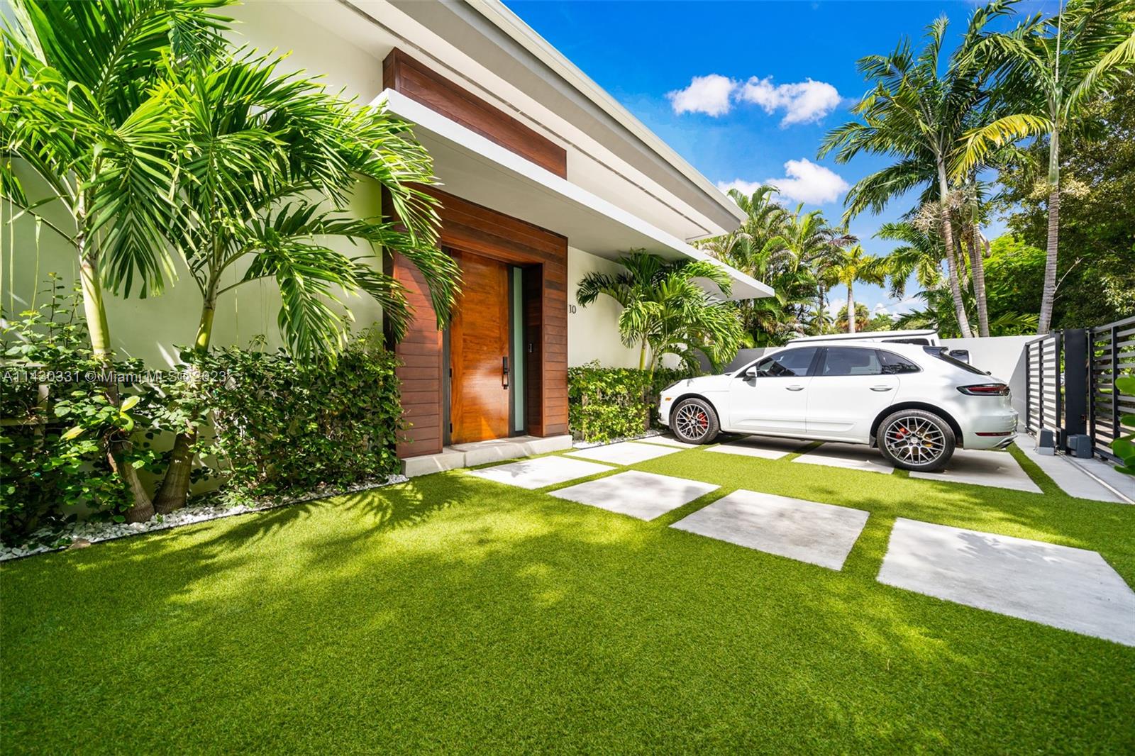 First time on the market! This turn-key modern home is just 1 block from Brickell and is ready to move in. High ceilings, gated property with security cameras, modern kitchen with quartz countertops, large closet in primary suite, beautiful pool with low maintenance artificial turf throughout.