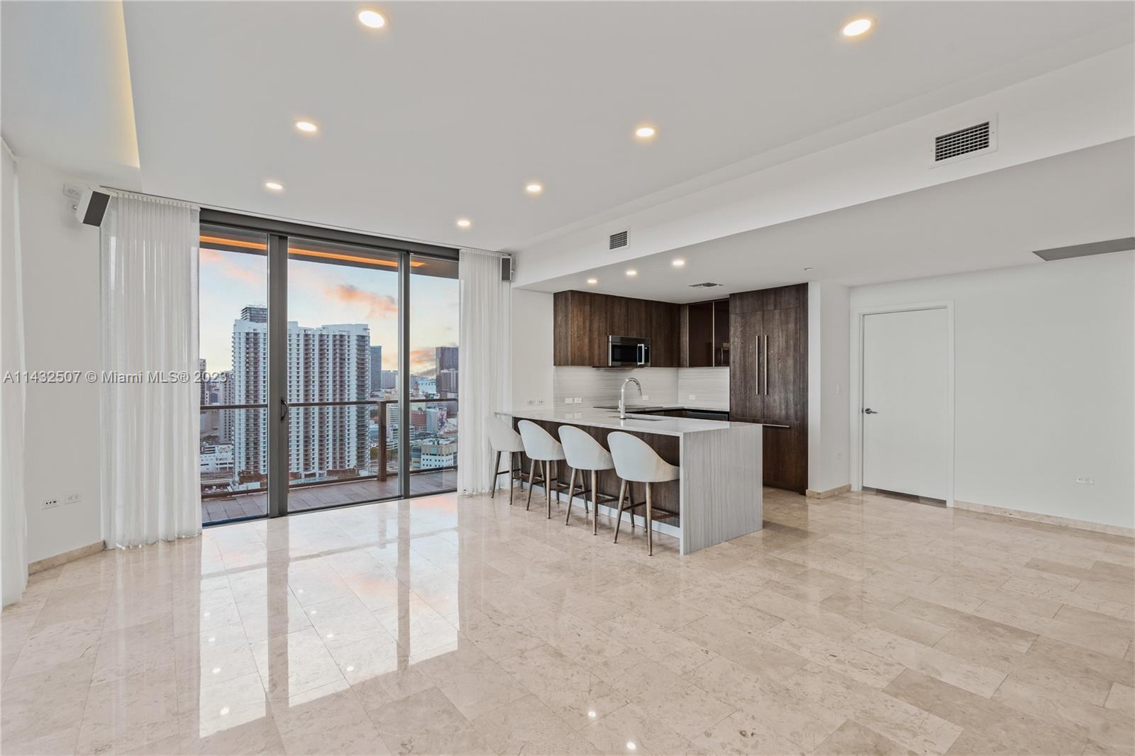 Rise Condo at Brickell is a luxurious residential building in Miami's vibrant Brickell neighborhood. This  3-bedroom,  3.5-bathroom unit offers spacious living areas, modern finishes, and breathtaking views. The kitchen features high-end Bosch appliances, stylish cabinetry, and a convenient walk-in pantry. Amenities include a fitness center, spa, swimming pool, landscaped garden, sauna, steam room, kids playground, library, and business center. Enjoy easy access to restaurants, shops, and major highways. Experience a luxurious lifestyle.