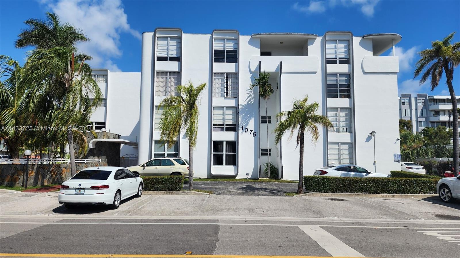 Exquisitely remodeled 1bed/1.5bath Condo located at Atrium Condo is impeccable and ready to move in. Owner has spared no expense in the total remodeling of this charming condo. Unit offers new kitchen/quartz counters, Top of line SS appliances, flooring, baths, A/C, electrical+plumbing, Impact windows, light fixtures & more. One assigned parking space is visible from living area. Unit has generous closet space & great lighting from many windows. The open layout makes for great living in a boutique bldg that is slated for more improvements planned for future. This unit is best in class for the area. Property is located blocks to Kane Concourse (96 St) shopping & dining amenities & a short walk to beach areas. Come home to the Atrium Condo in Bay Harbor Isles and Live Well!