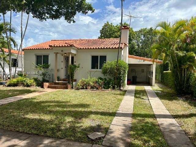 Timeless Jewel! Great opportunity to live in the City Beautiful that offers superior public services with one of the lowest tax millage rates in Miami Dade County. Enjoy the great location, only a stroll away from art galleries, restaurants, trolley stop, shoppes and entertainment of Downtown Coral Gables. Perfectly nestled on a tree canopy street, it is an uber-charming Old Spanish residence with 3BR/2BA, an oversized lot of 6,600 sq.ft. with spacious back yard with fruit trees and space for a pool. Bright living room with a working fireplace, formal dining room, beamed ceiling, hardwood floors, family room and one car garage and car port. This 1940 residence is surrounded by much more expensive homes and offers the opportunity to remodel to your taste and preferences. Don't miss it!