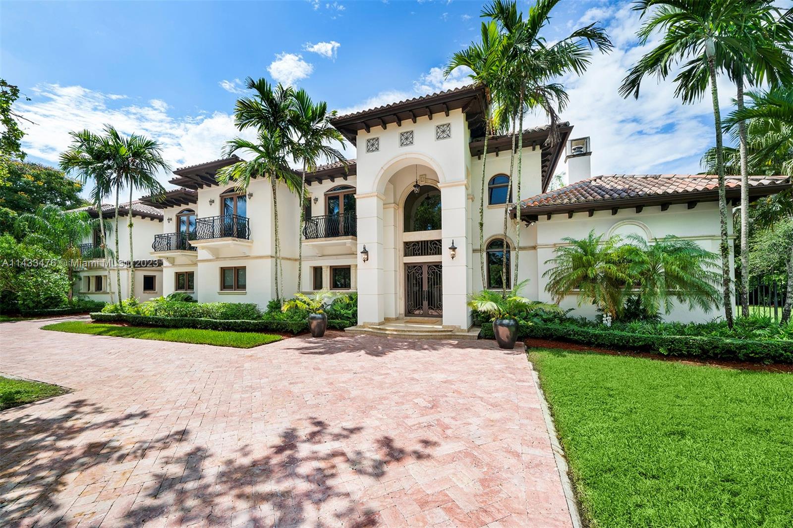 This attractive 9,267 sf Pinecrest residence with 6 bedrooms and 7.5 baths presents a rare blend of timeless elegance and modern luxury. Situated on a sprawling 35,283 sq ft lot, the outdoor areas are perfect for hosting friends or family gatherings, with a sparkling pool and spa, summer kitchen and expansive covered patio. The interior features an open layout, adorned with high-end finishes, coffered ceilings, custom lighting, and large windows that bathe the rooms in natural lighting. Other features include a spacious office with fireplace, media room that can be converted to a guest suite, a luxurious ensuite primary bedroom and additional ensuite rooms. Conveniently located close to highly rated schools and the Pinecrest community center.