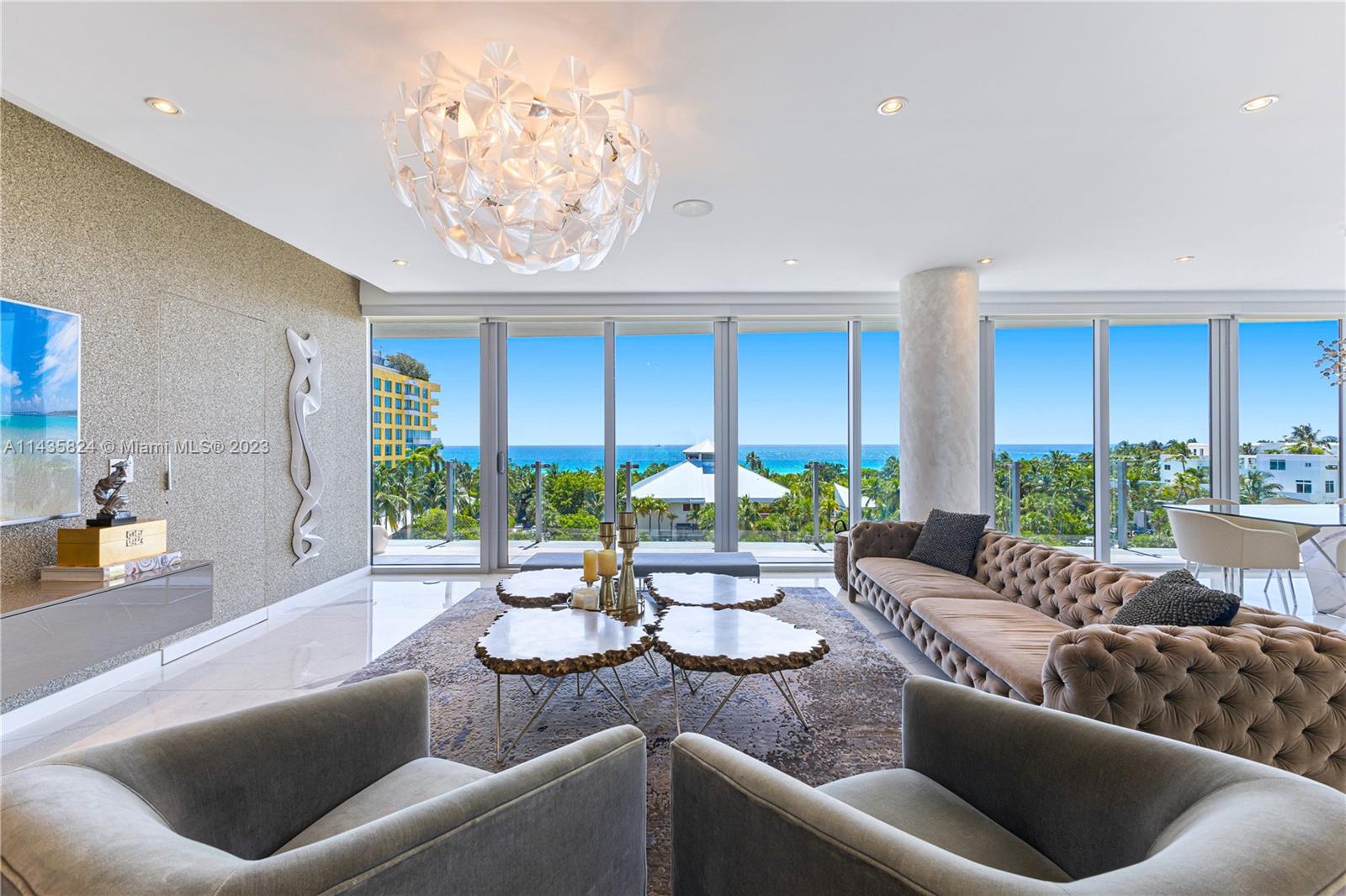 FABULOUS OCEANFRONT LUXURY FOR THE ENTERTAINER IN THIS 5 BEDROOM RESIDENCE AT ONE OCEAN IN SOUTH OF 5th NEIGHBORHOOD! Nestled in the Highly Sought-After North Tower. Elegant Corner Half-Floor 5 Bedroom + 5.5 Bath Residence with Private Elevator Entry into Open Living Area Encompassing 3,329 Interior SF + 600 SF of Wraparound Terrace. 10 FT High Ceilings + Textured Wallpapers Adorning Every Room. Energy Efficient Floor-to-Ceiling Windows, Porcelanosa Marble Floors. Eat-in Kitchen with SS Sub-Zero, Wolf Appliances & Cabinetry by Italcraft. 2 Car Garage. One Ocean Designed by Architect Enrique Norten with Interiors by Yabu Pushelberg & Landscape Design by Enzo Enea. Amenities include Beach Service, Fitness Center, Infinity-Edge Pool & Outdoor Entertaining Deck, Spa, Valet & 24 Hour Concierge