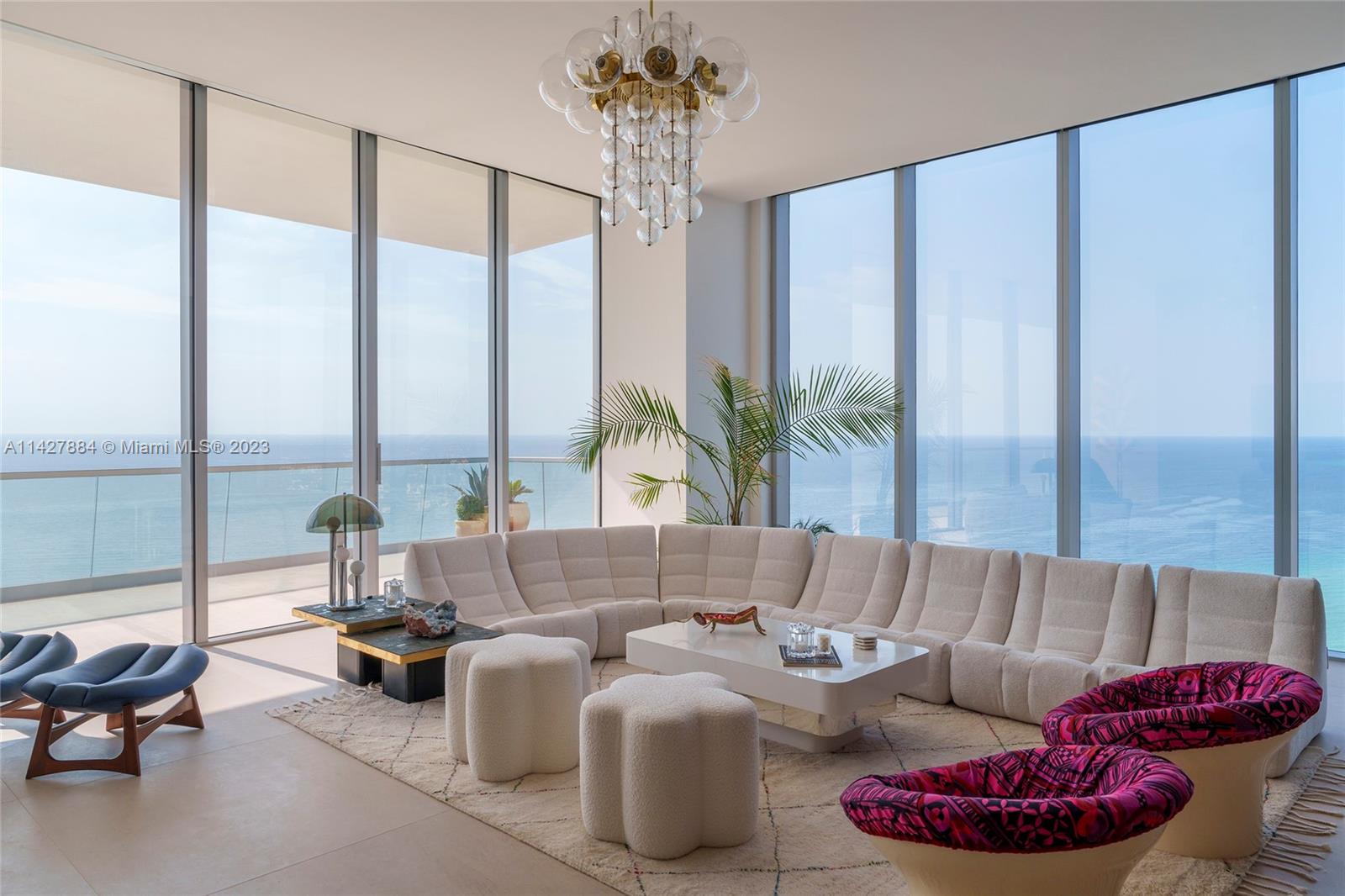 A space where nature, culture & modern architecture collide amidst the untamed allure of Miami. A southeast corner unit on the 42nd floor with sunrise & sunset terraces and unobstructed ocean views - this immaculate unit exudes a coastal vibe featuring stone & oak floors, an open dining area & chef’s kitchen and 12-ft ceilings. Designed with both function & style in mind, the kitchen offers custom jade countertops and Snaidero cabinetry, Miele, Viking & True appliances. The light-filled space wrapped in glass accesses the oceanside terrace for indoor-outdoor living. A secluded principal suite provides an ocean-view escape, custom walk-in closets & spa bathroom. 3 additional bedrooms & en-suite bathrooms offer a private respite to enjoy peaceful bayside terraces.