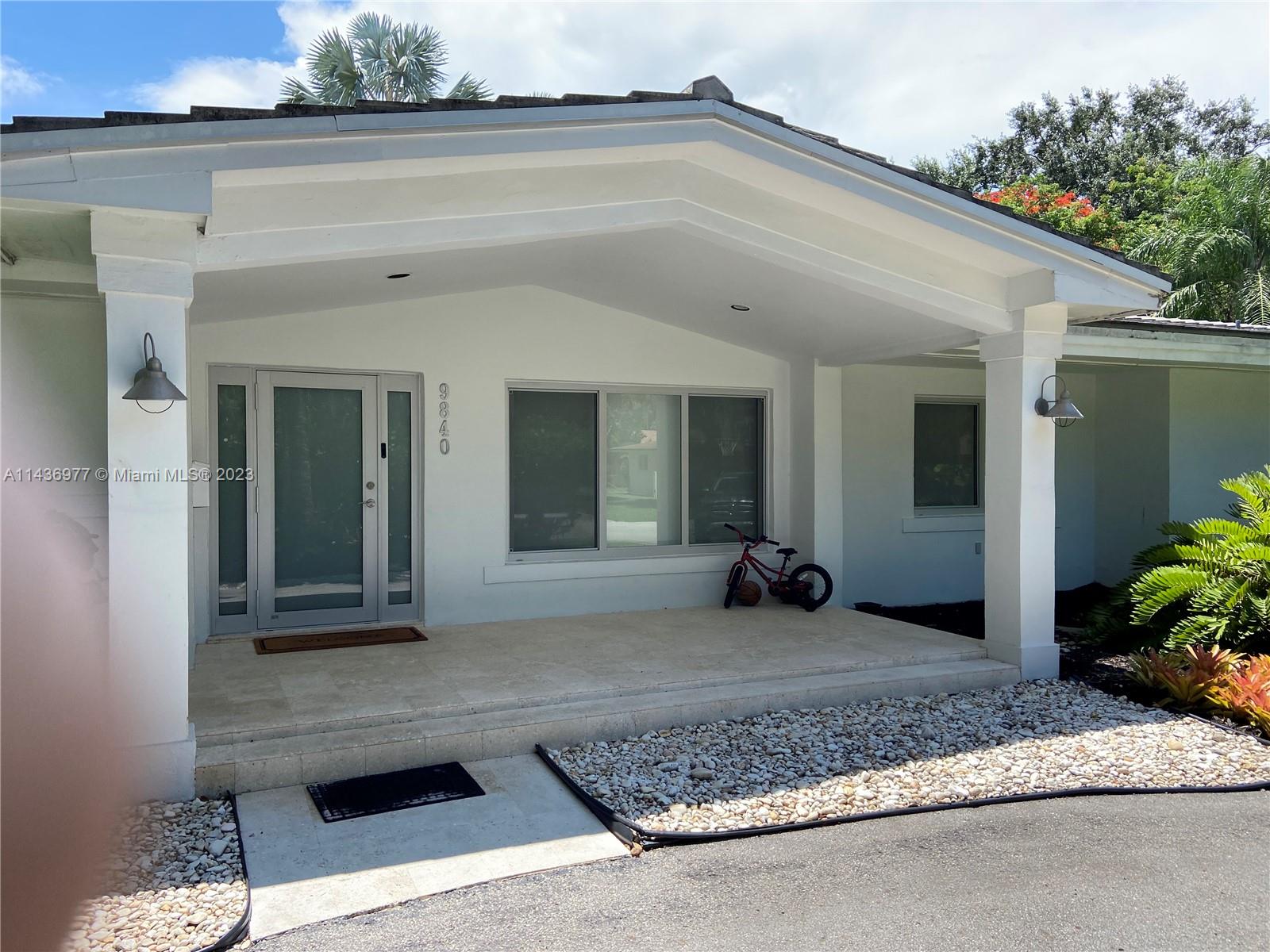 Spacious 4/3 North Pinecrest pool home.  Impact doors and windows throughout.  Freshly painted!  Porcelain tile throughout. Updated kitchen/baths. Beautiful garden.